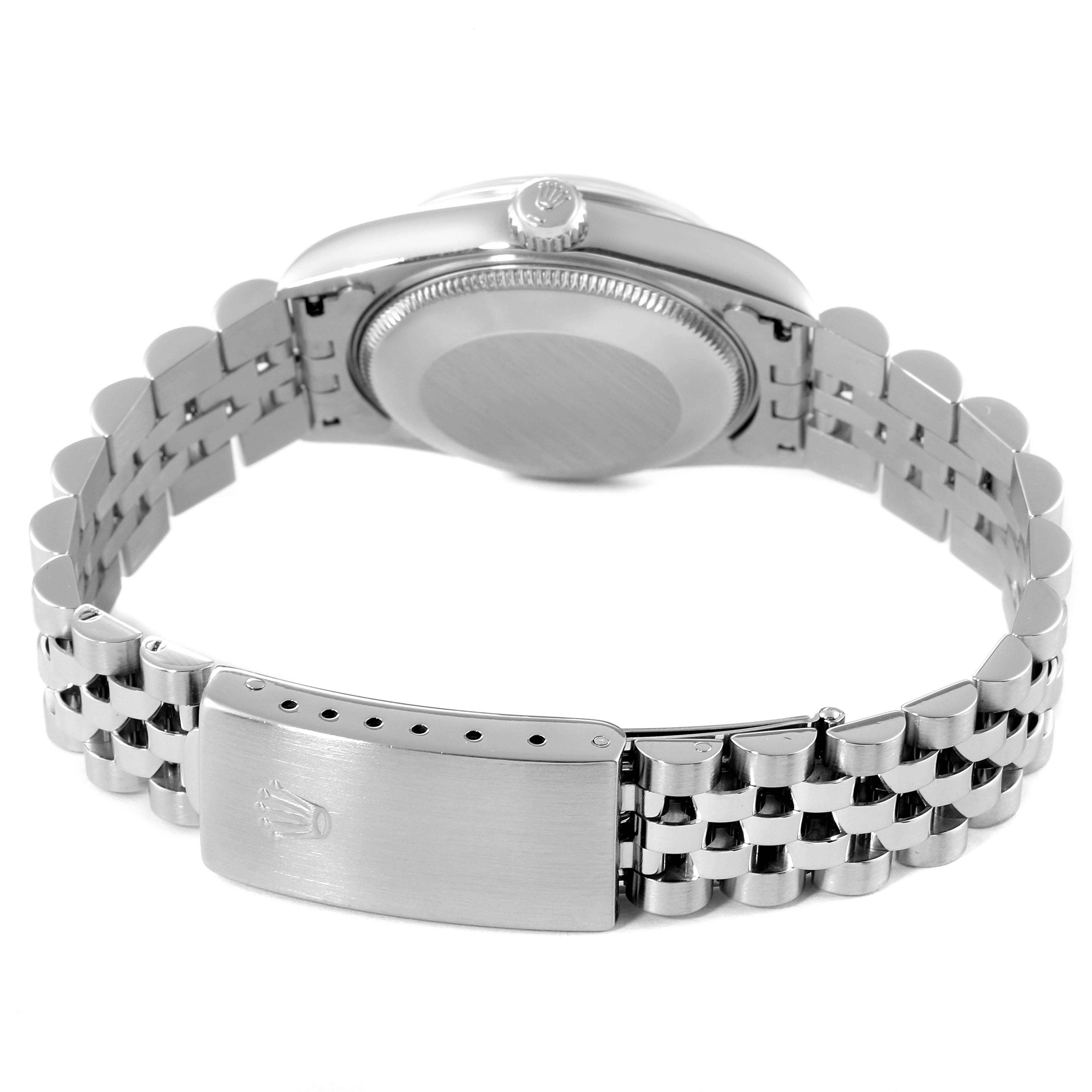 The image shows the back case and bracelet clasp of a Rolex Mid-Size 68240 Women
s Stainless Steel Blue Dial 68240 Women
s Stainless Steel Blue Dial model watch.