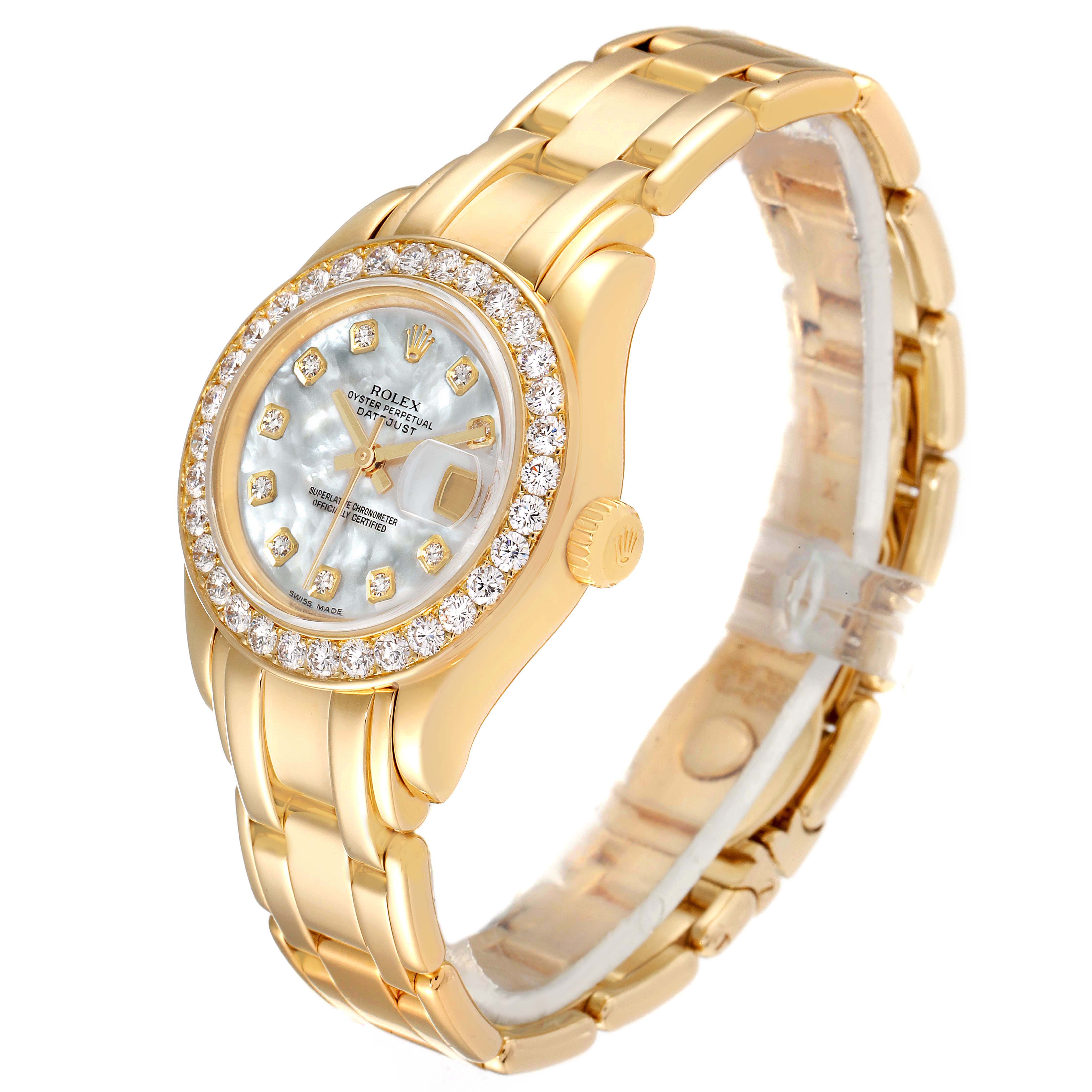 This is a side-angle view of a Rolex Pearlmaster 69298 Women's Yellow Gold Mother of Pearl Dial 69298 Women's Yellow Gold Mother of Pearl Dial, showcasing its gold bracelet and diamond-studded bezel.