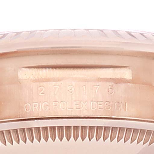 This image shows a close-up view of the side of a Rolex President 279175 Women's Rose Gold Brown Dial 279175 Women's Rose Gold Brown Dial model watch case, featuring the model number and "ORIG. ROLEX DESIGN" engraving.