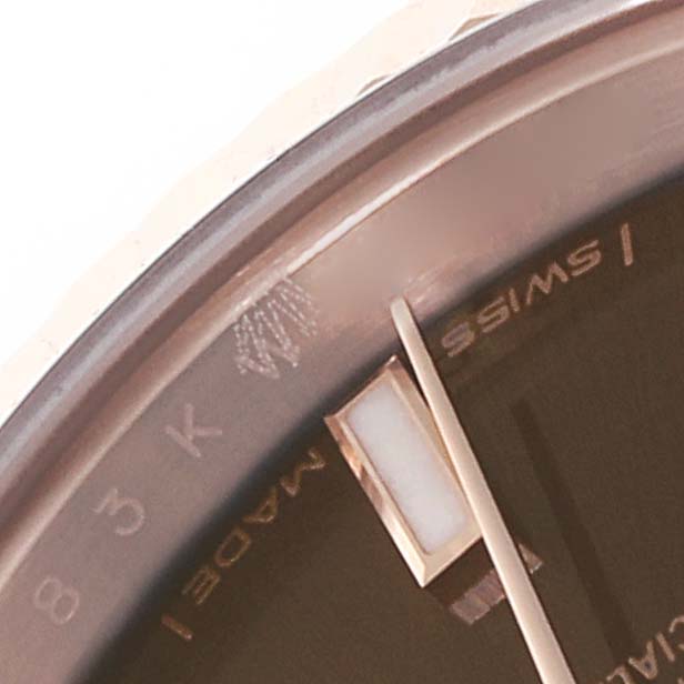 Close-up of the Rolex President 279175 Women's Rose Gold Brown Dial 279175 Women's Rose Gold Brown Dial watch, showing part of the dial, hands, and "Swiss Made" text.