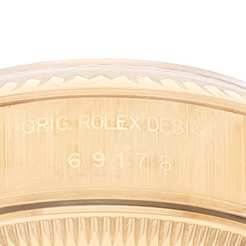 This image shows a close-up of the side of a Rolex President 69178 Women
s Yellow Gold Champagne Dial 69178 Women
s Yellow Gold Champagne Dial model watch case, displaying the model number 69178.