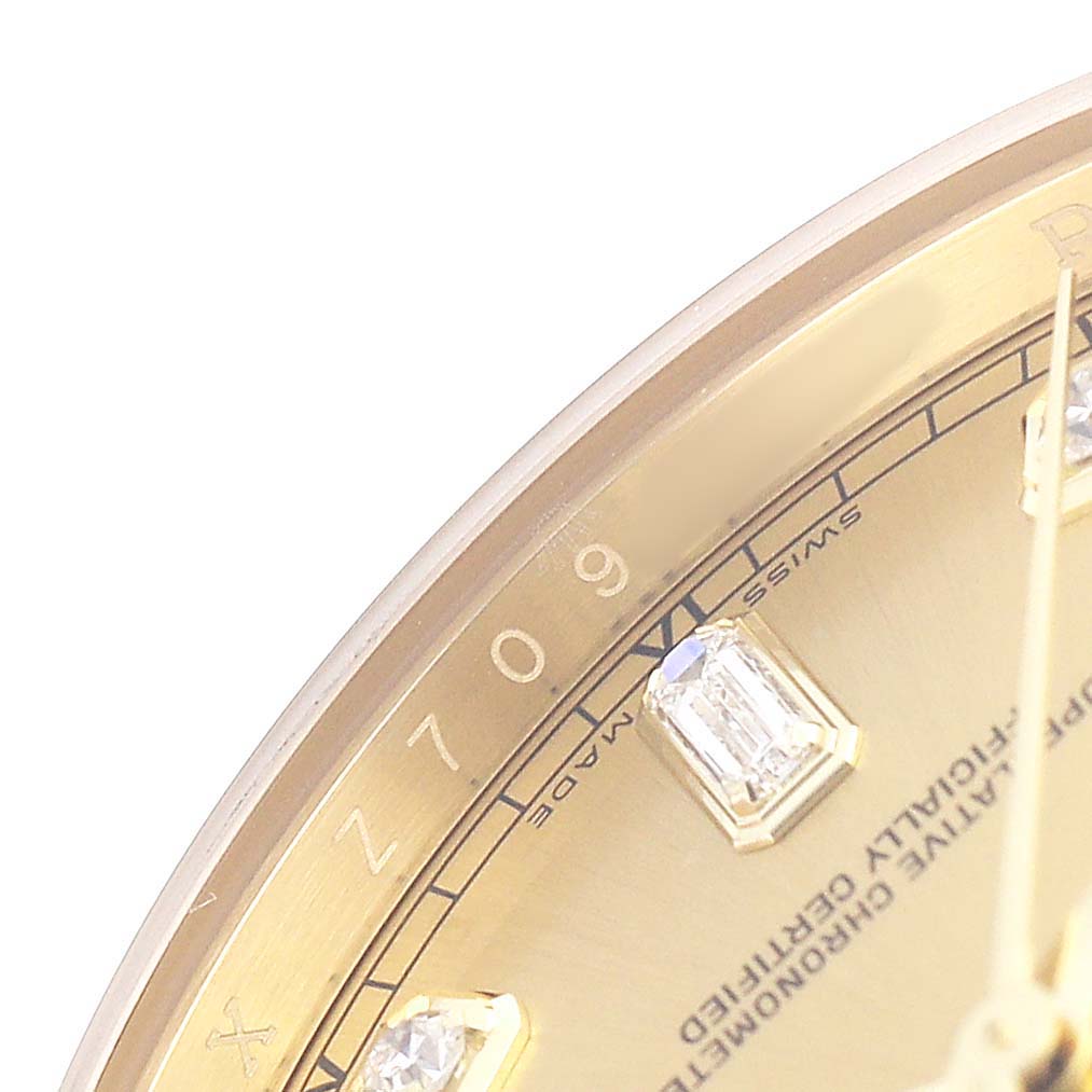 The image shows a close-up of the Rolex President 118238 Men's Yellow Gold Champagne Dial watch face, highlighting part of the dial, diamond markers, and edge of the bezel.