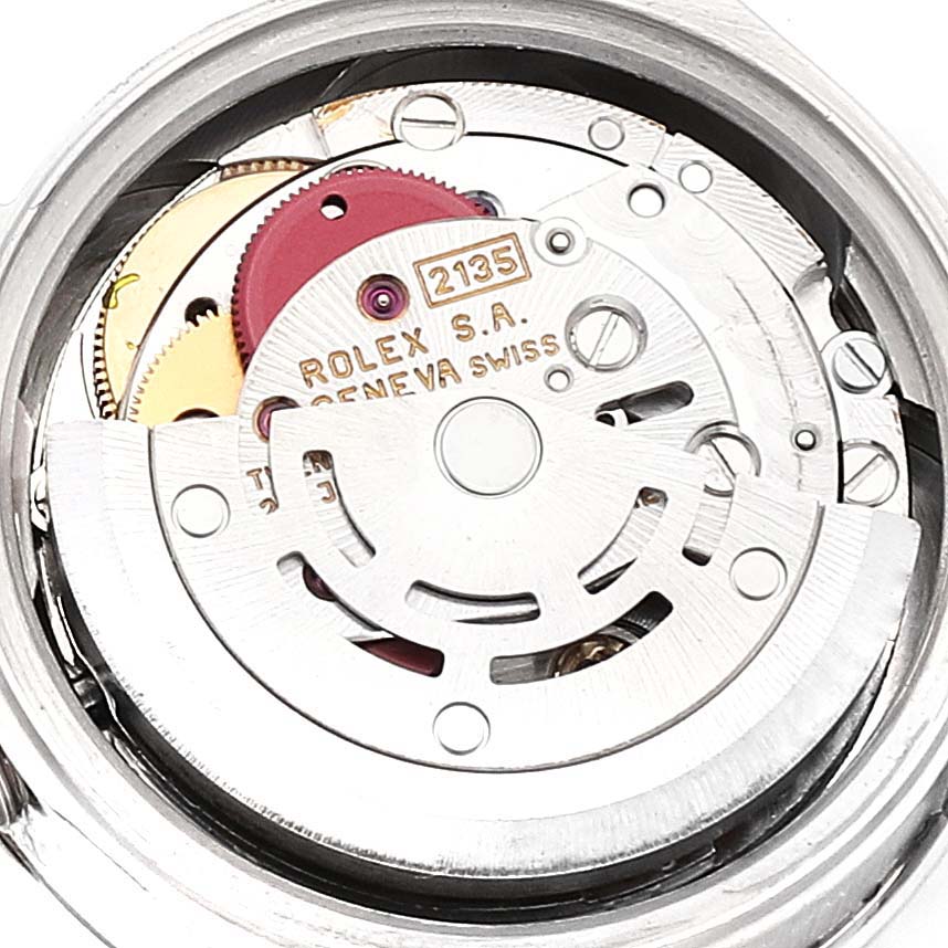The image shows the movement mechanism of a Rolex President 69136 Women's Platinum Silver Dial 69136 Women's Platinum Silver Dial model watch from a close-up, rear angle.