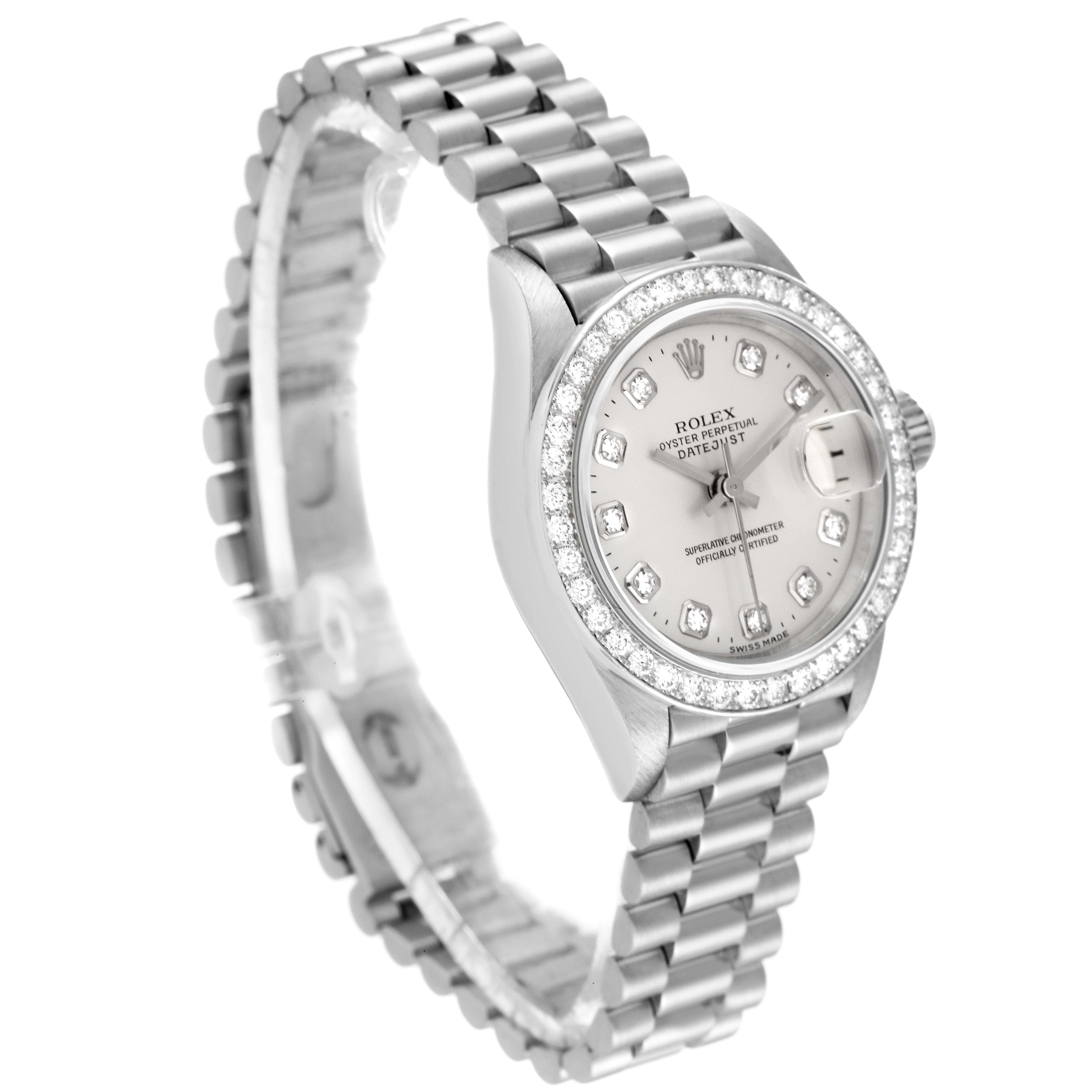 The President model Rolex watch is shown at a slight angle, highlighting the face, bezel, and bracelet.