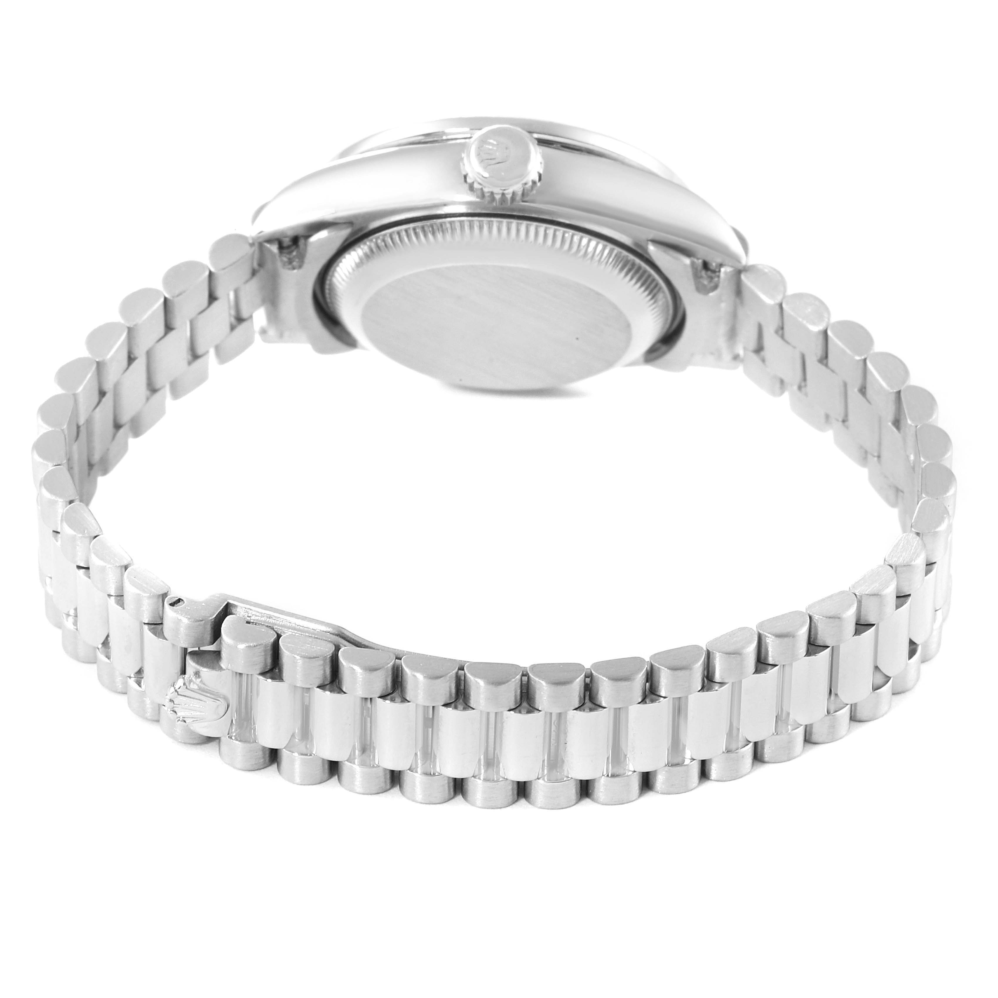 The image shows the back and side of the Rolex President 69136 Women's Platinum Silver Dial 69136 Women's Platinum Silver Dial model watch, highlighting the case back and part of the linked bracelet.