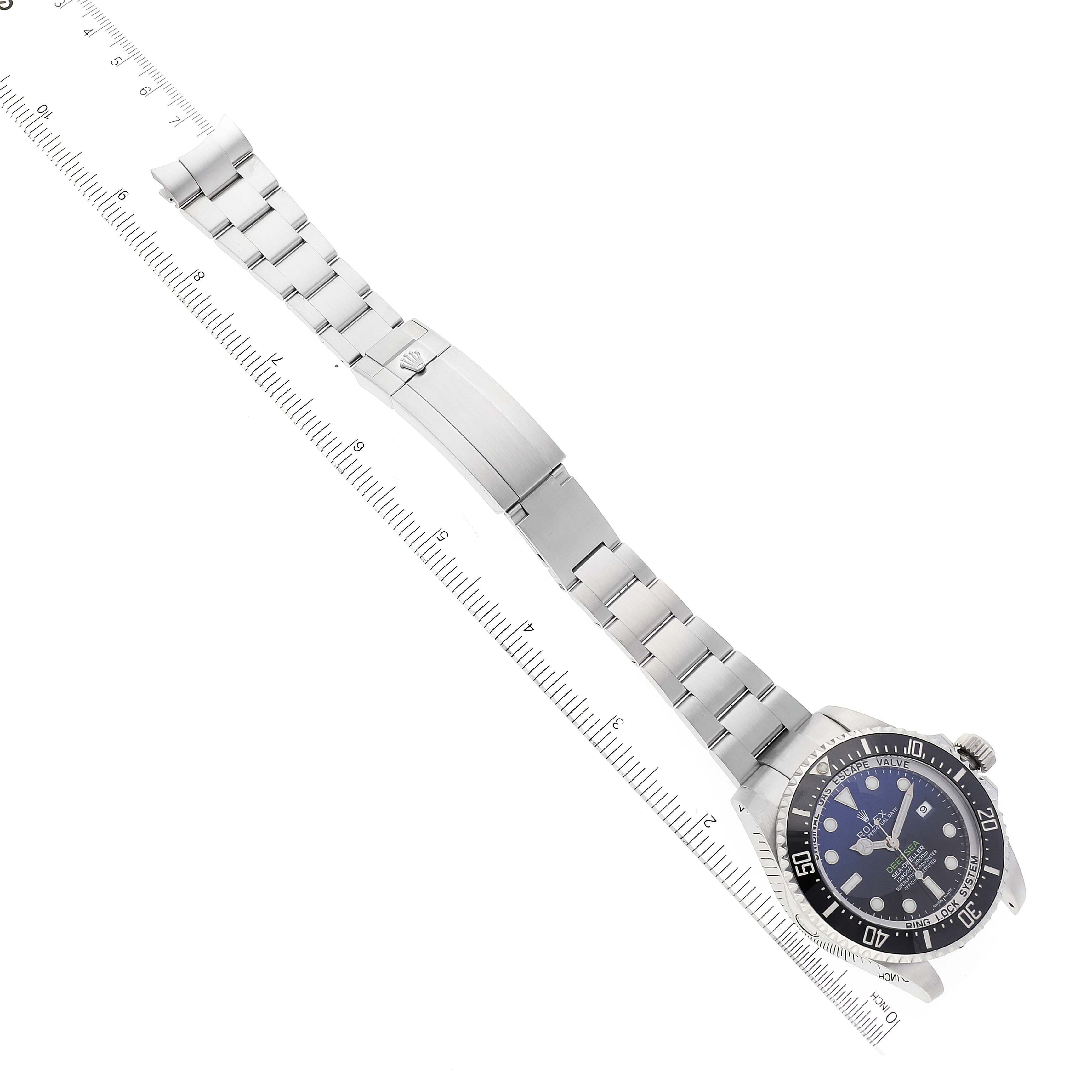 This image shows the Rolex Sea-Dweller 116660 Men's Stainless Steel Blue Dial 116660 Men's Stainless Steel Blue Dial watch from a top-down angle, highlighting its face, bezel, and metal bracelet.