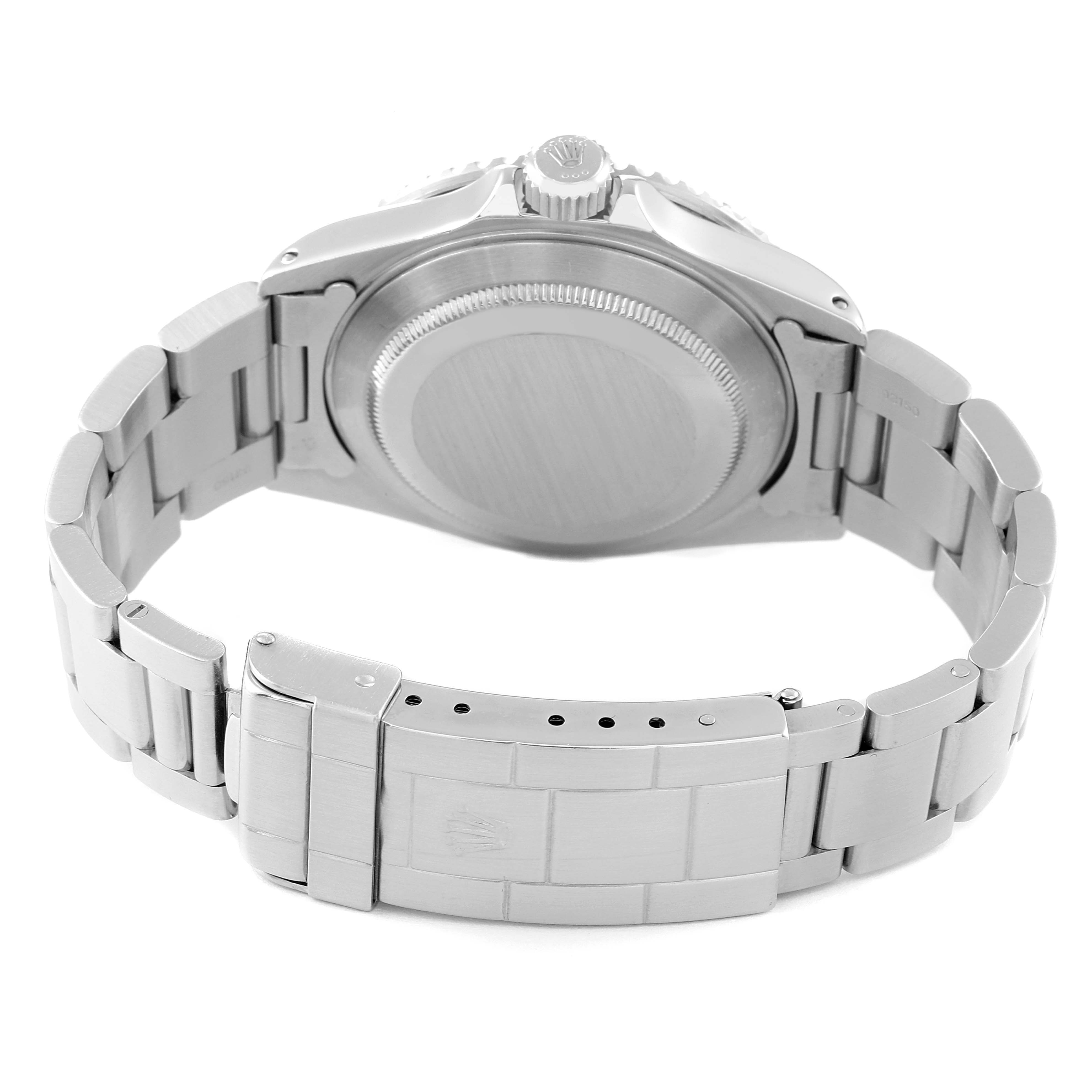 The image shows the back case and bracelet of a Rolex Submariner 16610 Men
s Stainless Steel Black Dial 16610 Men
s Stainless Steel Black Dial watch from a rear angle.