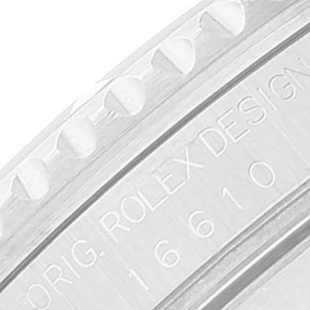 This image shows a close-up of the bezel and rehaut of a Rolex Submariner 16610 Men
s Stainless Steel Black Dial 16610 Men
s Stainless Steel Black Dial watch, displaying text and the model number "16610".