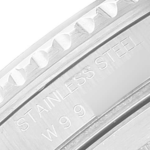 The image shows a close-up angle of the bezel and part of the case back of a Rolex Submariner 16610 Men
s Stainless Steel Black Dial 16610 Men
s Stainless Steel Black Dial watch with "STAINLESS STEEL" engraved.