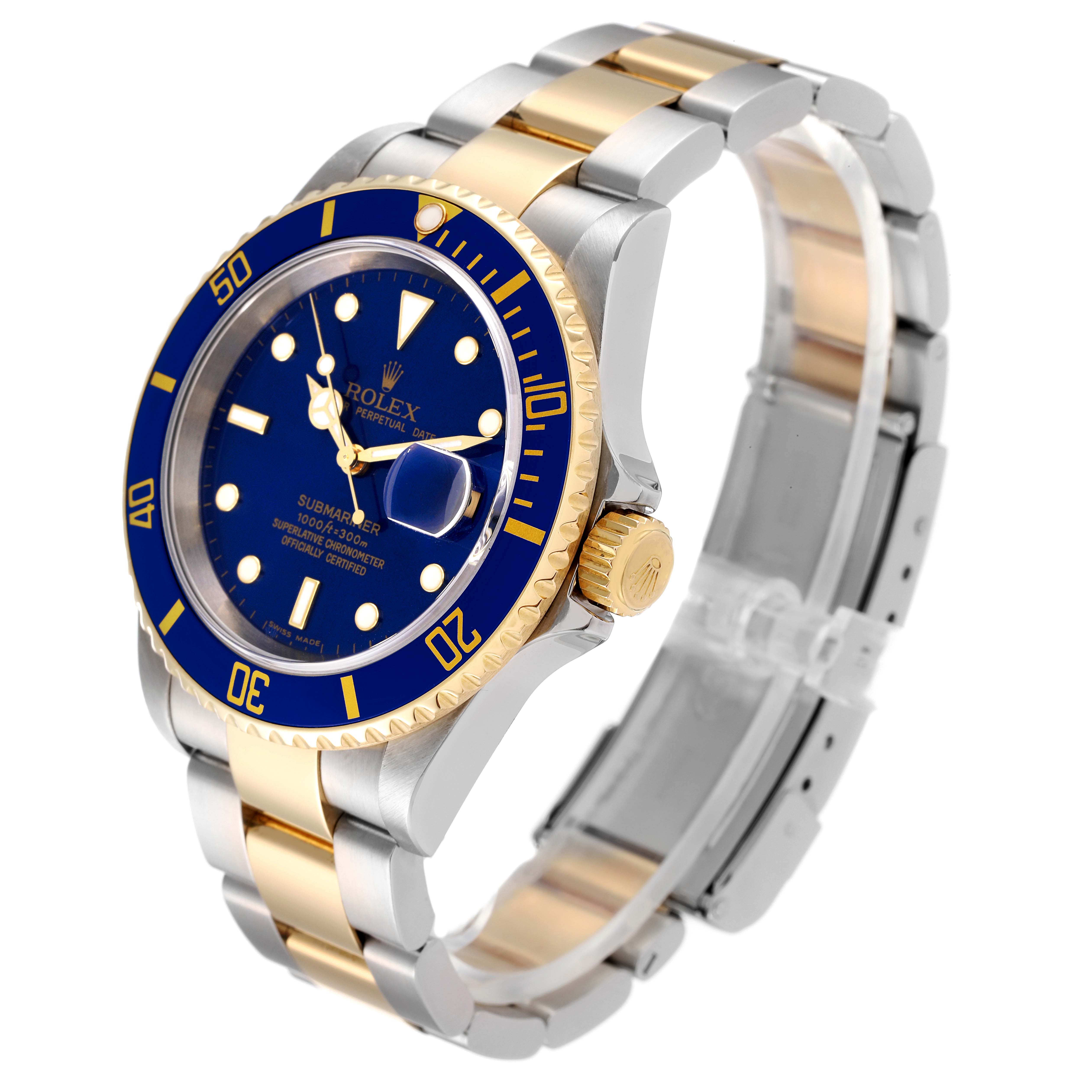This image shows a Rolex Submariner 16613 Men's Steel and Gold (two tone) Blue Dial 16613 Men's Steel and Gold (two tone) Blue Dial watch at a three-quarter angle, highlighting its blue dial, gold bezel, and bi-color bracelet.