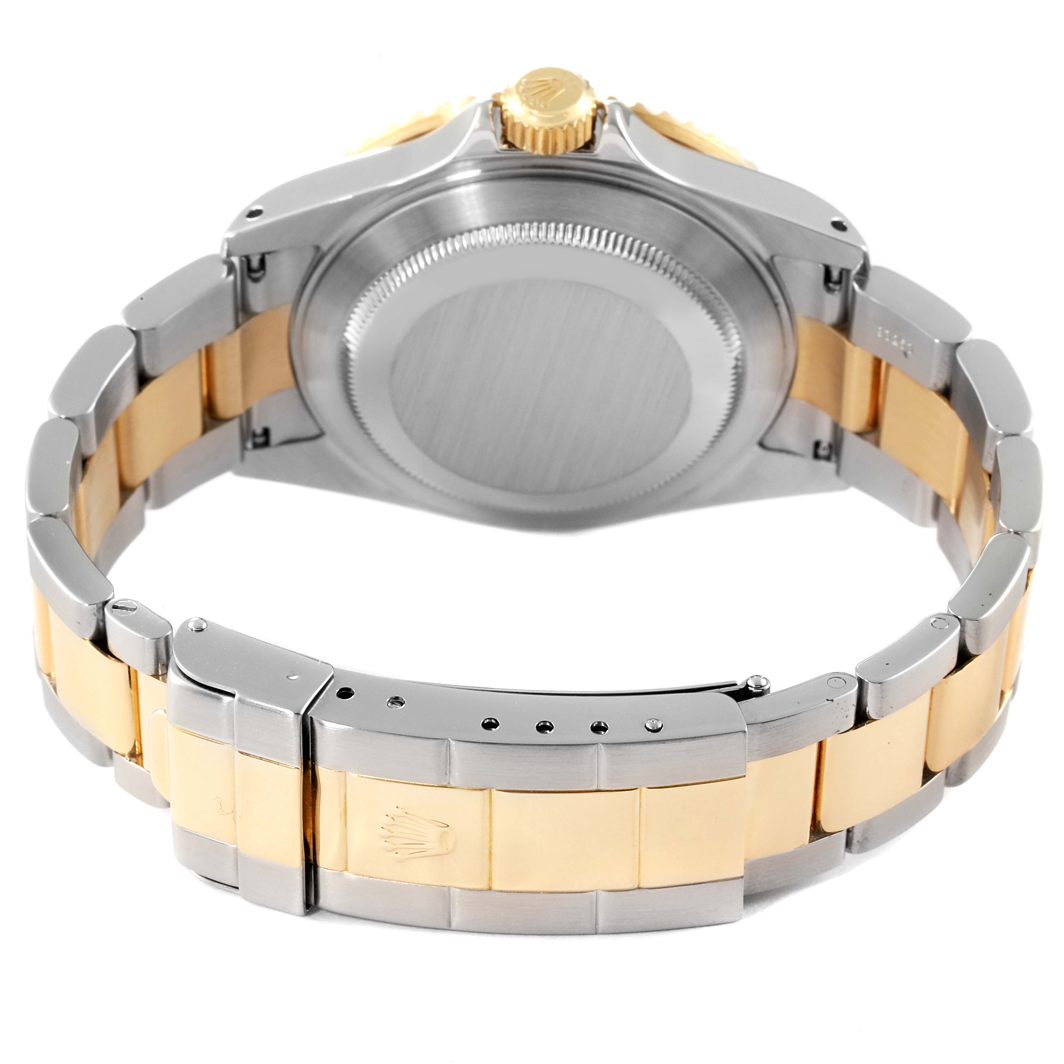 The image shows the back view and bracelet of a Rolex Submariner 16613 Men's Steel and Gold (two tone) Blue Dial 16613 Men's Steel and Gold (two tone) Blue Dial watch, highlighting its two-tone metal design.