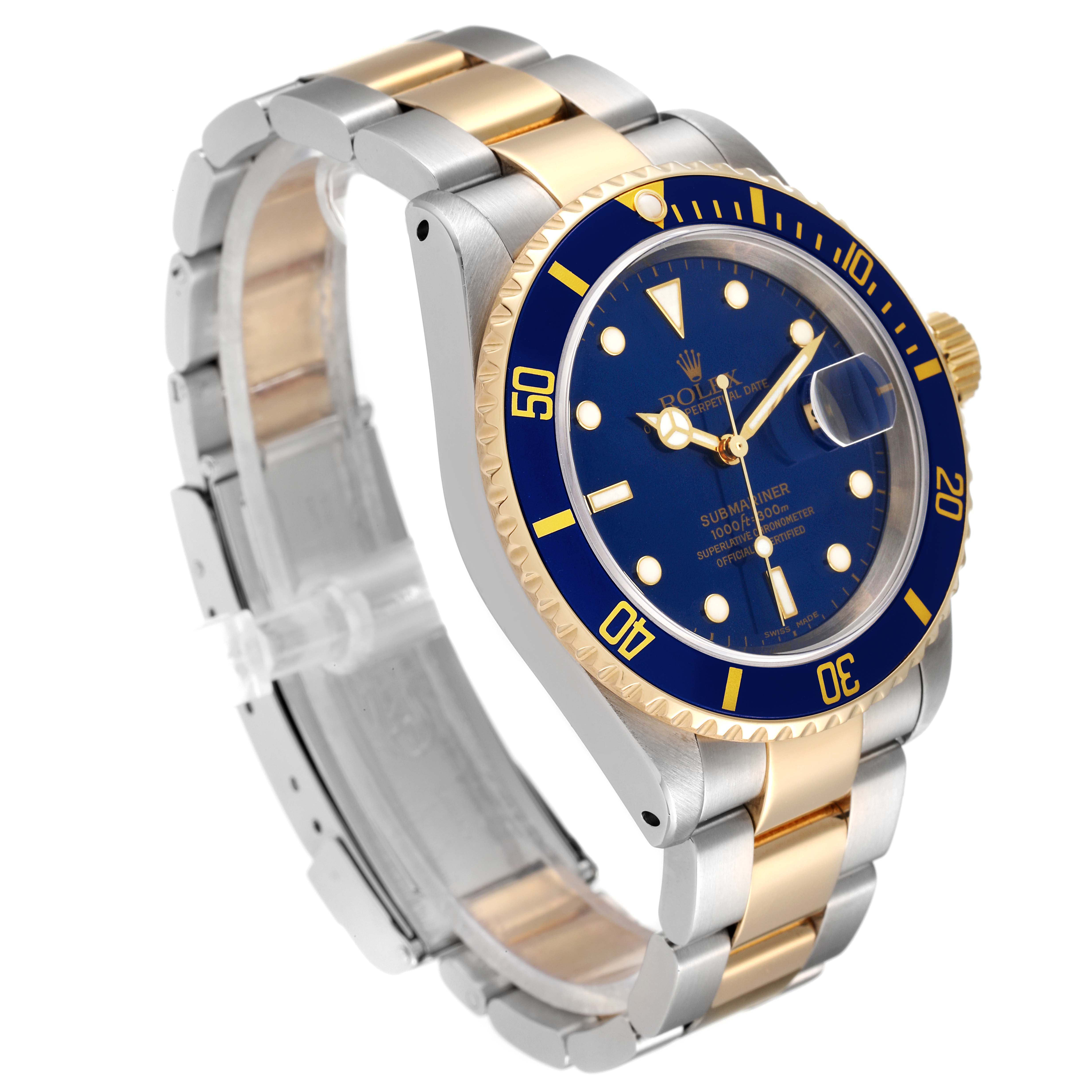 The image shows a Rolex Submariner 16613 Men's Steel and Gold (two tone) Blue Dial 16613 Men's Steel and Gold (two tone) Blue Dial watch at a three-quarter angle, highlighting the blue dial, gold bezel, and two-tone bracelet.