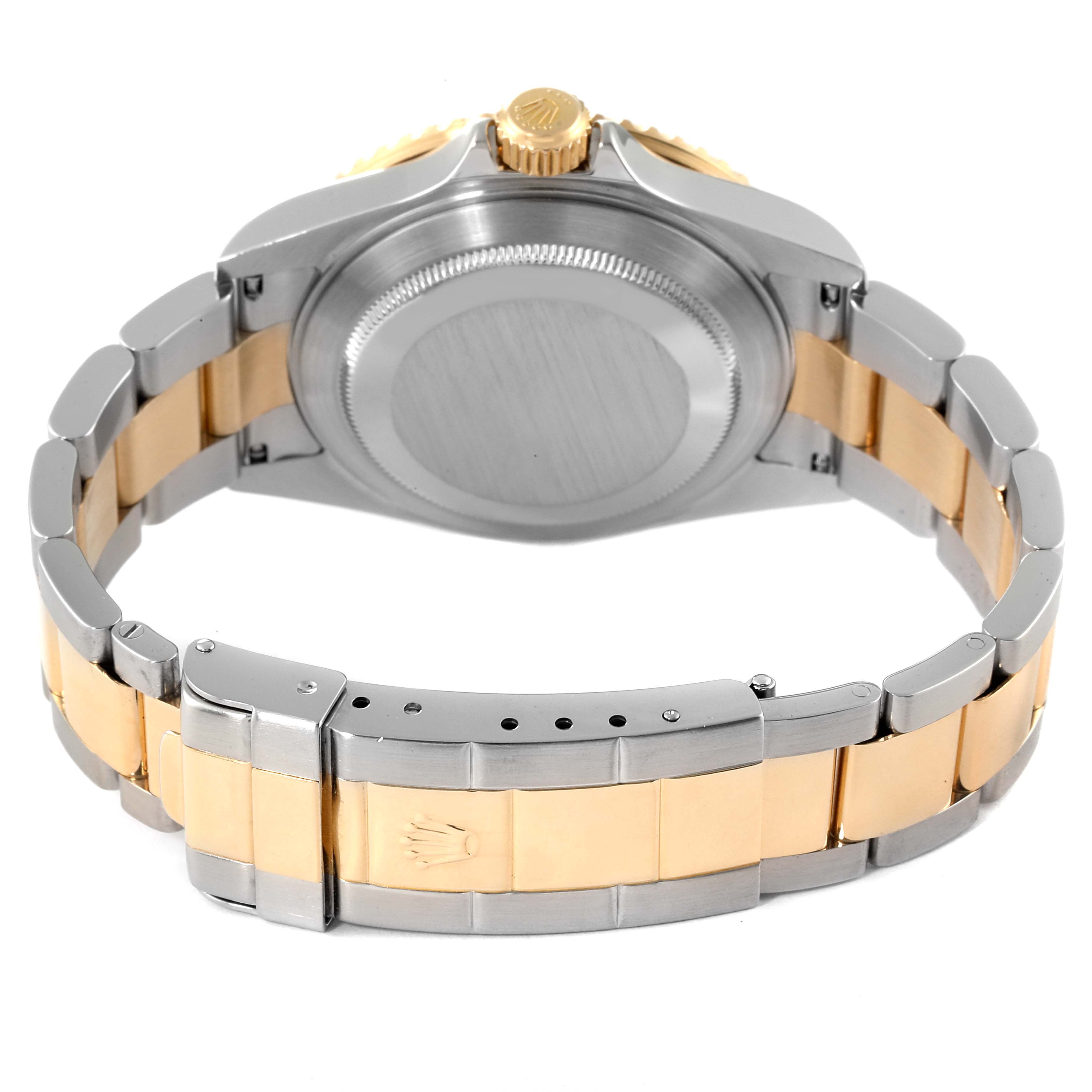 This image shows the back case and bracelet of a Rolex Submariner 16613 Men
s Steel and Gold (two tone) Blue Dial 16613 Men
s Steel and Gold (two tone) Blue Dial watch, viewed from the rear.