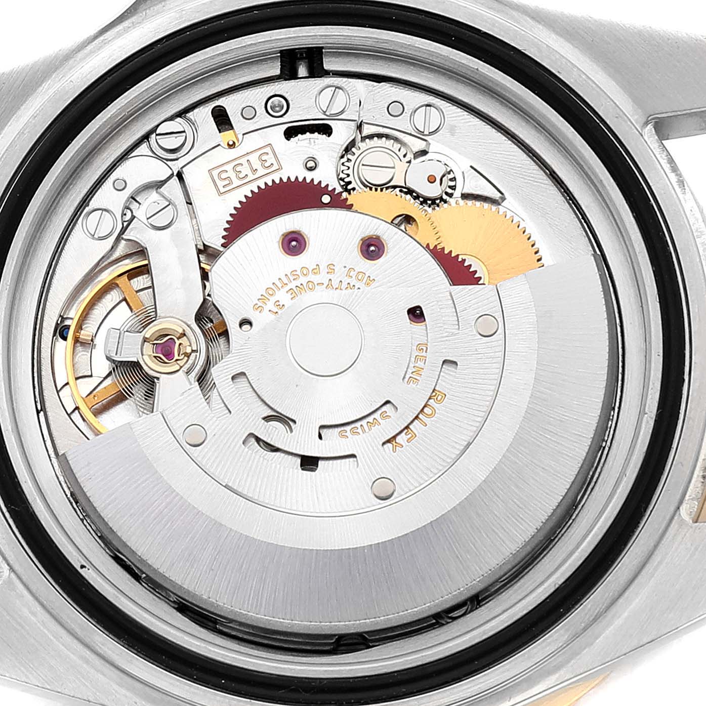 This image shows the internal mechanism of a Rolex Submariner 16613 Men
s Steel and Gold (two tone) Blue Dial 16613 Men
s Steel and Gold (two tone) Blue Dial watch, including gears and the rotor, viewed from the case back angle.