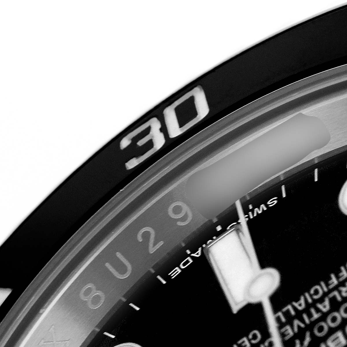 The image shows a close-up of the Rolex Submariner M116610LN-0001 Men's Stainless Steel Black Dial's bezel, dial, and part of the date window.