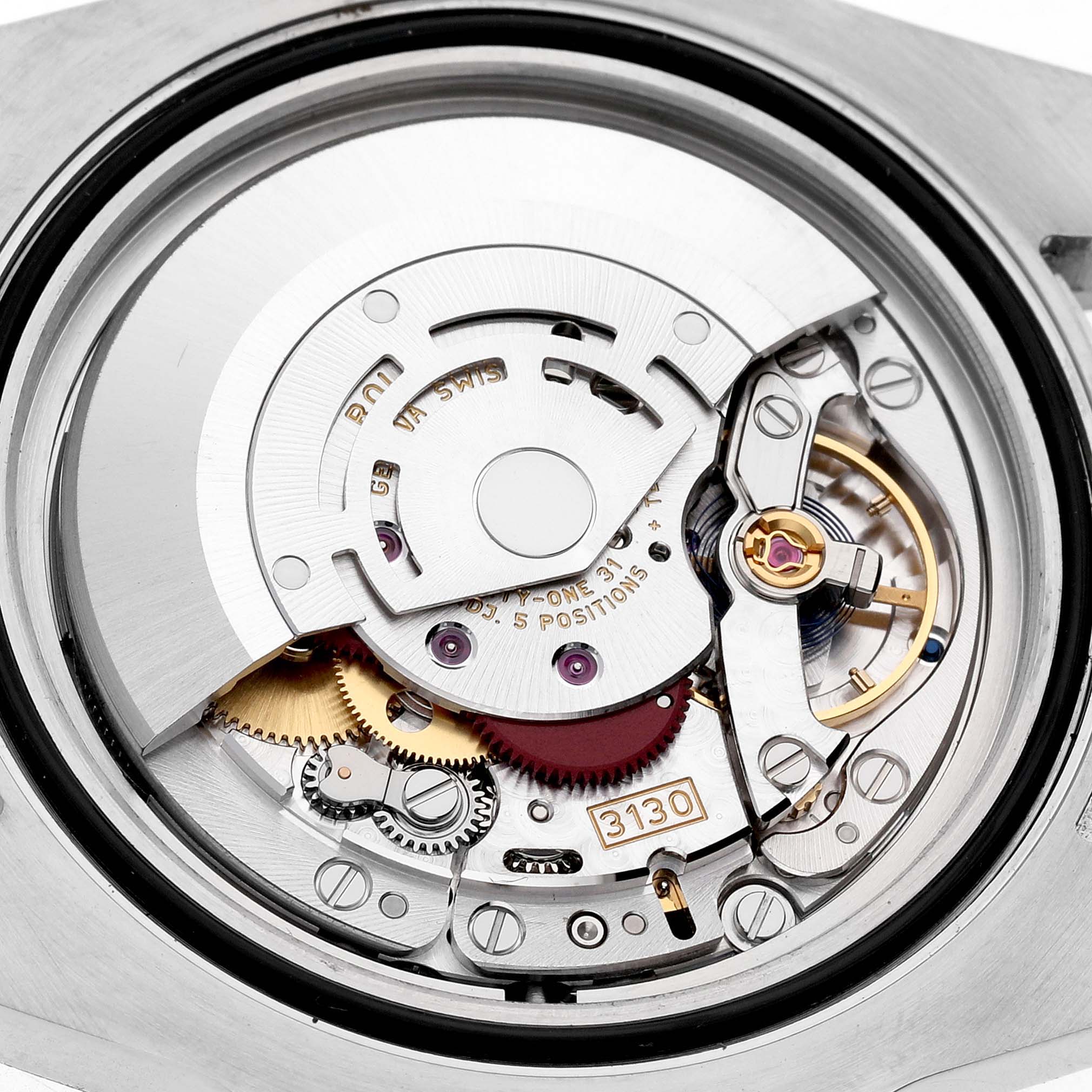 The image shows a detailed close-up of the Rolex Submariner 114060 Men's Stainless Steel Black Dial's movement from the back, highlighting its mechanical components.