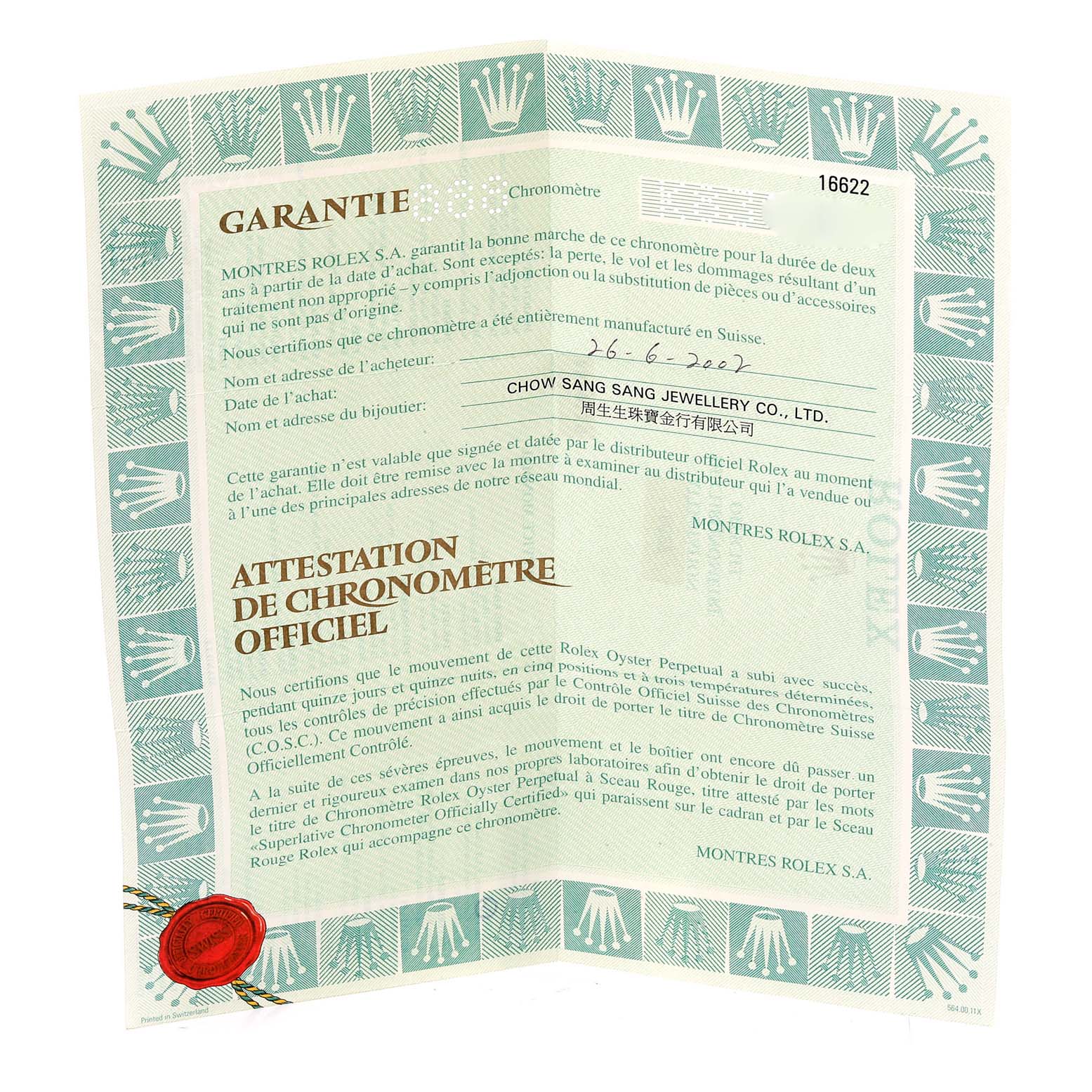 The image shows the warranty certificate for a Yacht-Master model by Rolex, displayed at a slight angle.