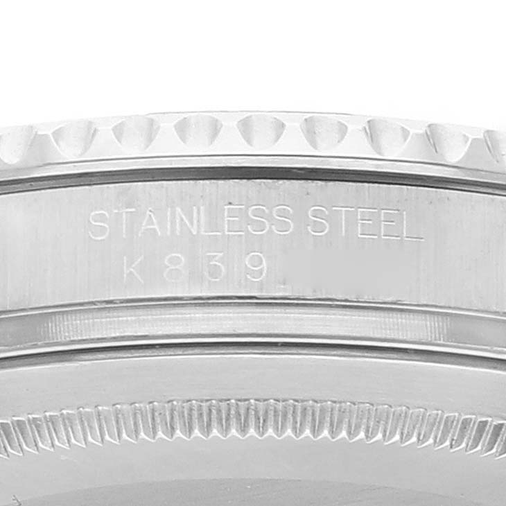 This image shows a close-up of the case side of a Rolex Yacht-Master 16622 Men's Stainless Steel Silver Dial 16622 Men's Stainless Steel Silver Dial watch, highlighting the stainless steel and serial number engraving.