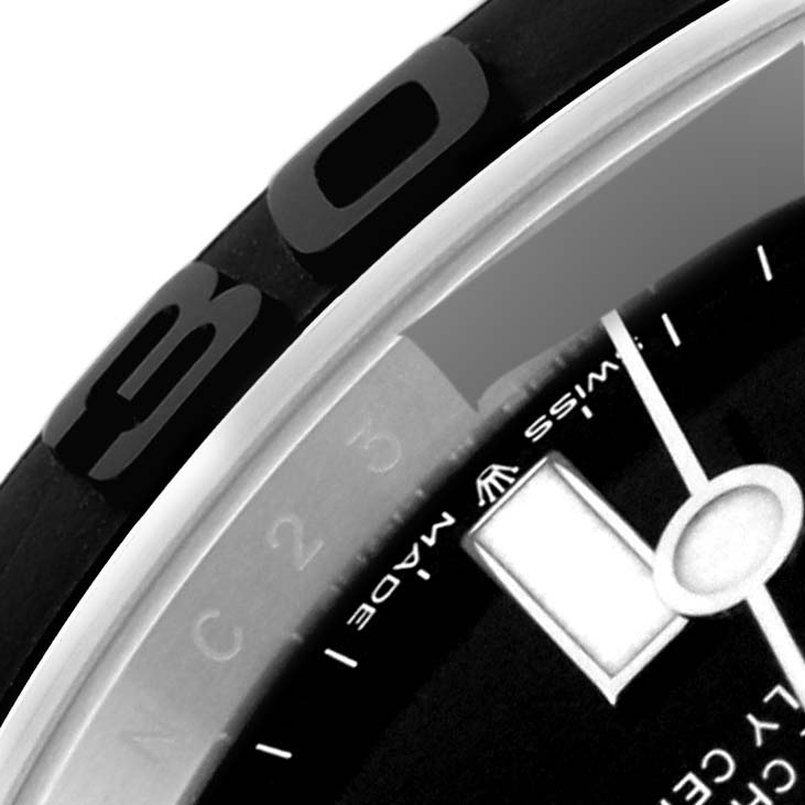 The image shows a close-up of the bezel, part of the dial, and the minute hand of a Rolex Yacht-Master 226659 Men's White Gold Black Dial 226659 Men's White Gold Black Dial watch.