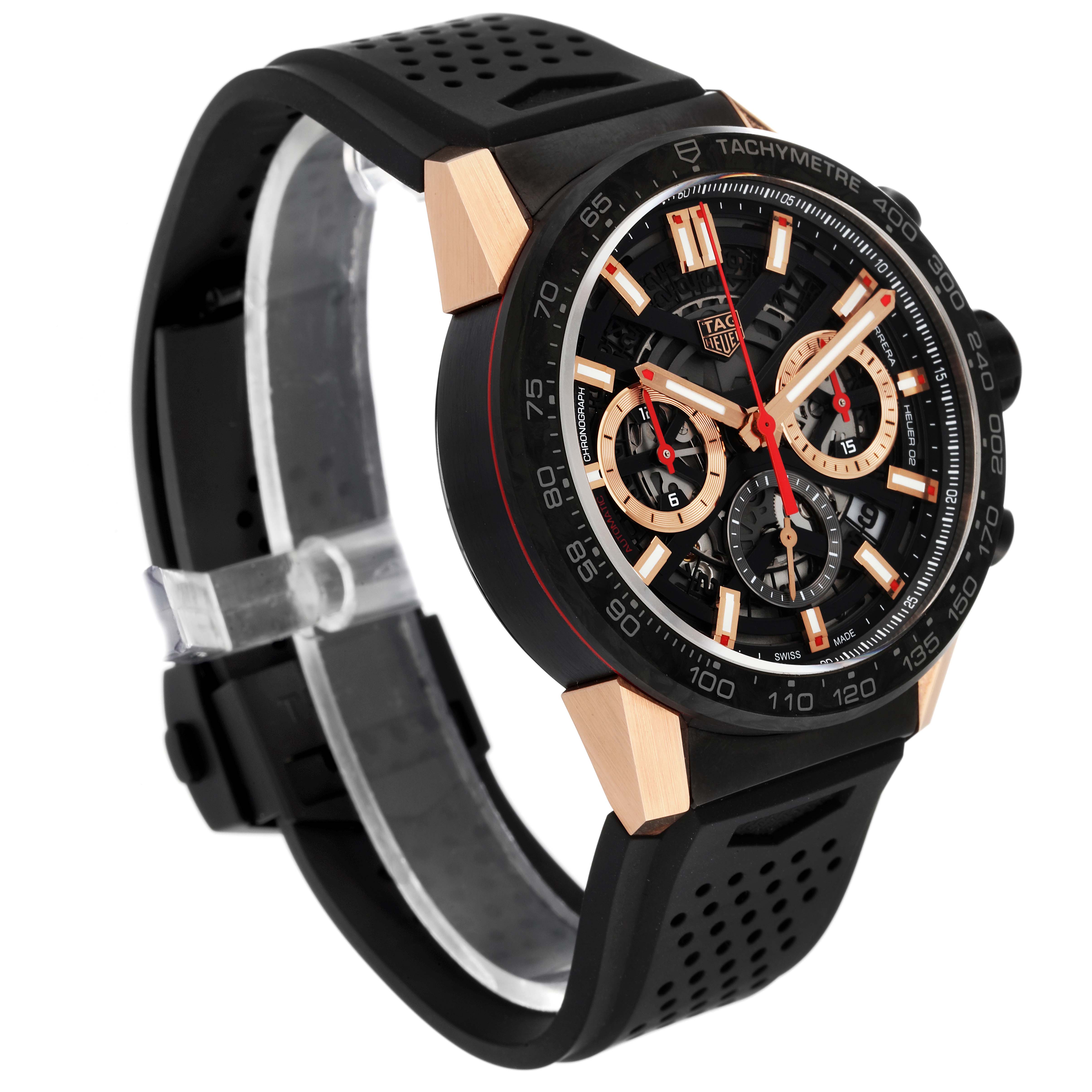 The image shows a side angle view of the Carrera model by Tag Heuer, highlighting the face, bezel, and black perforated strap.