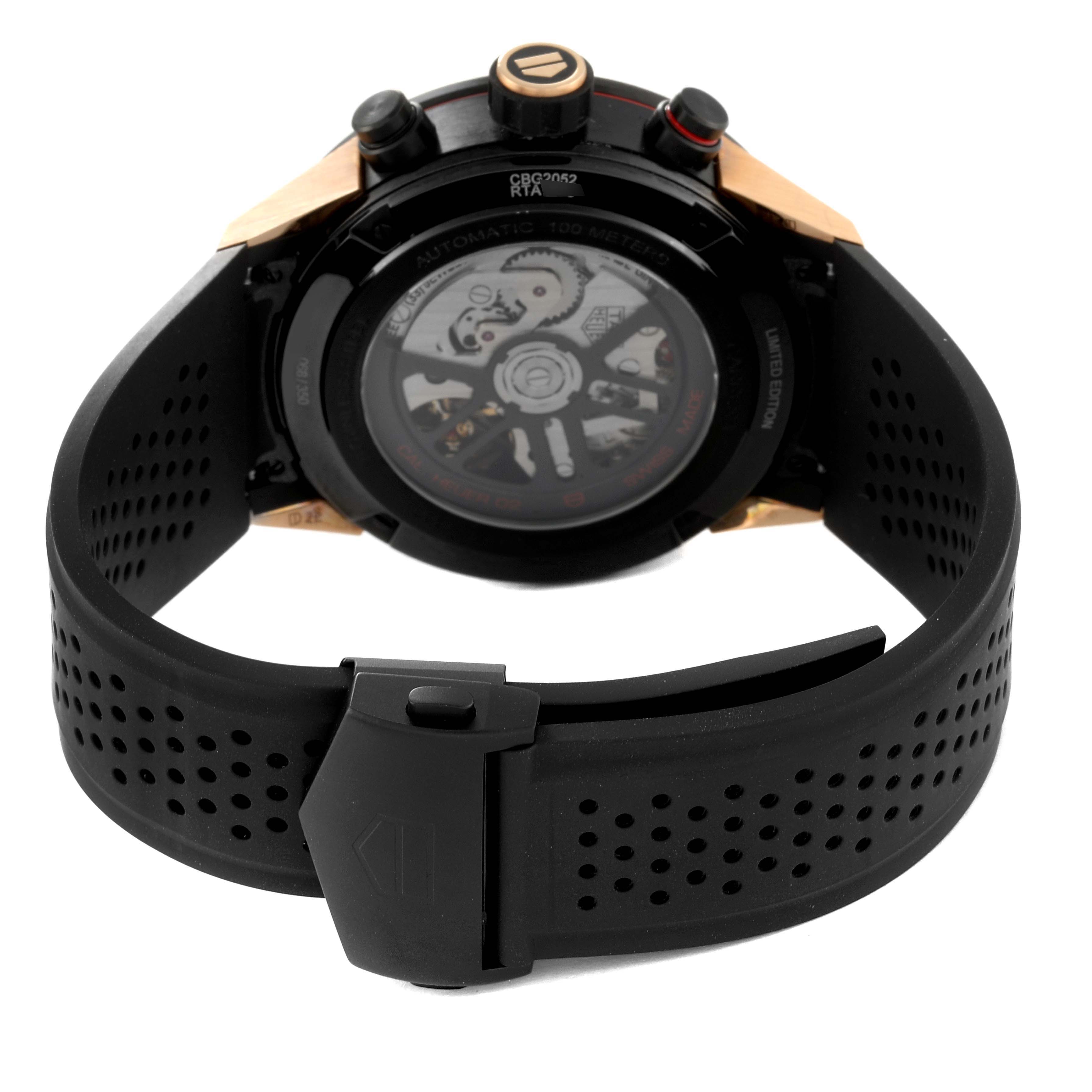 The image shows a rear view of the Tag Heuer Carrera CBG2052.FT6143 Men's Ceramic Black Dial CBG2052.FT6143 Men's Ceramic Black Dial watch, highlighting its black strap and the visible internal mechanism.