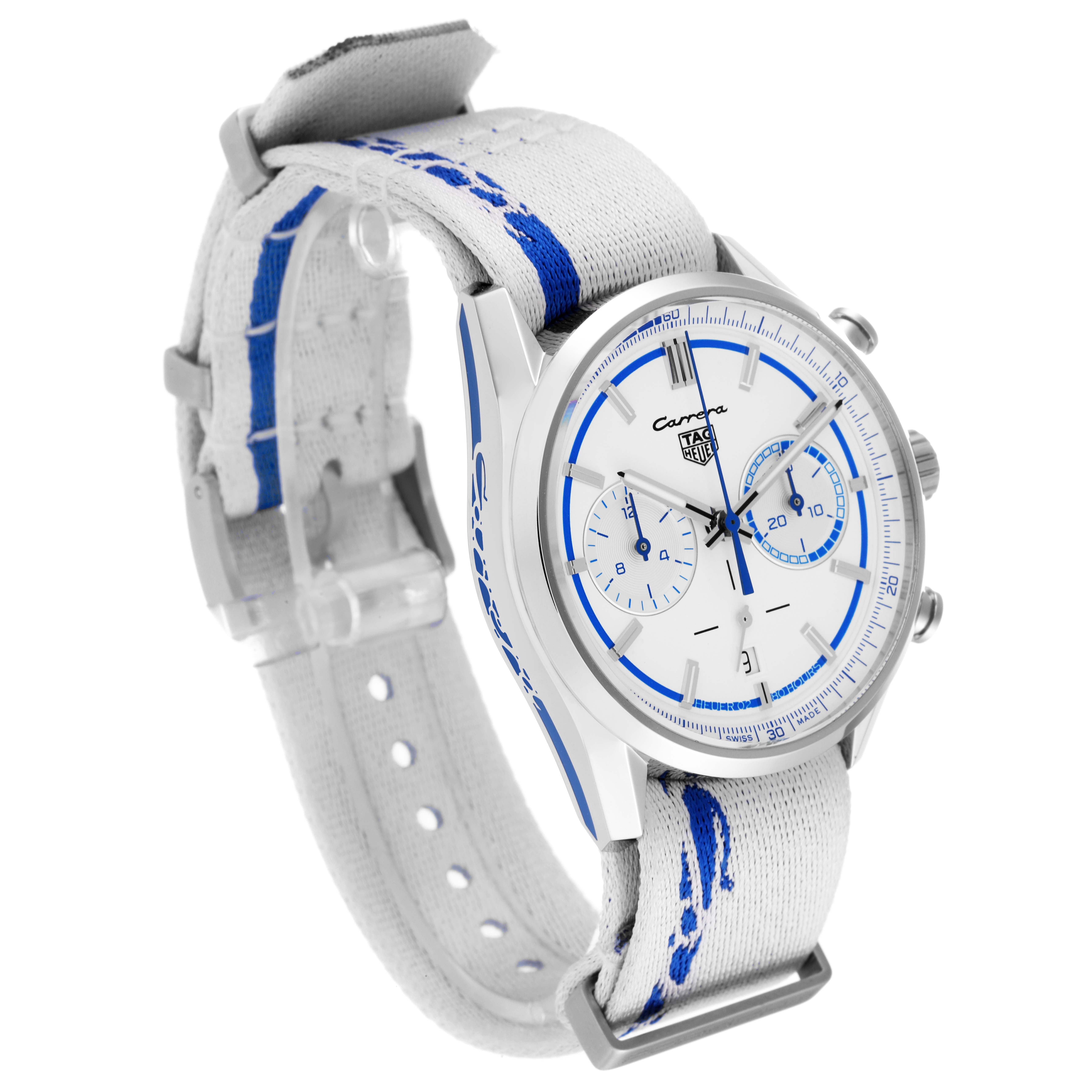 The image shows a Tag Heuer Carrera model watch from an angled view, displaying the face, bezel, and fabric strap.