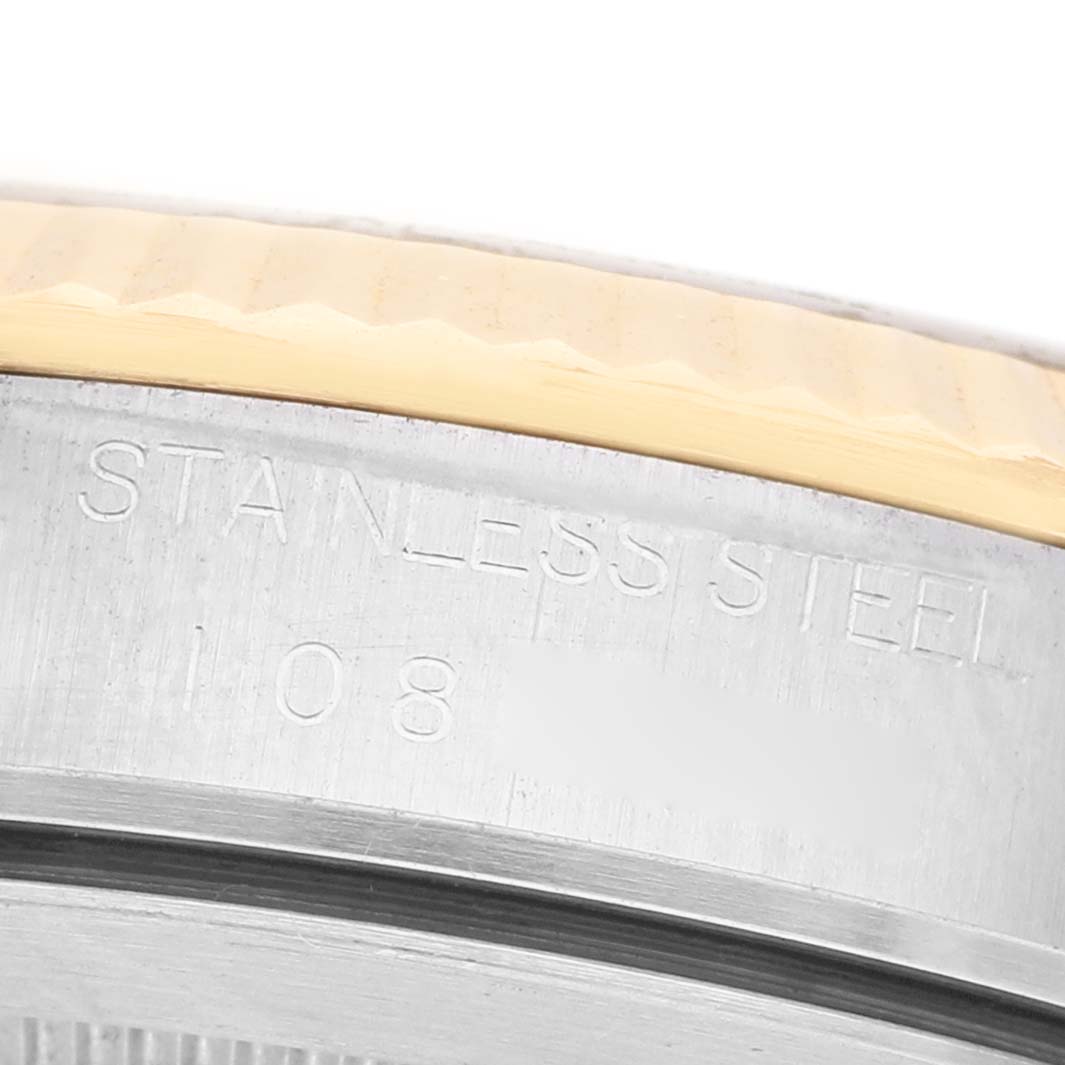 The image shows a close-up of the side of the bezel with "STAINLESS STEEL" engraved on the Tudor Prince 76213 Men's Steel and Gold (two tone) Silver Dial model.