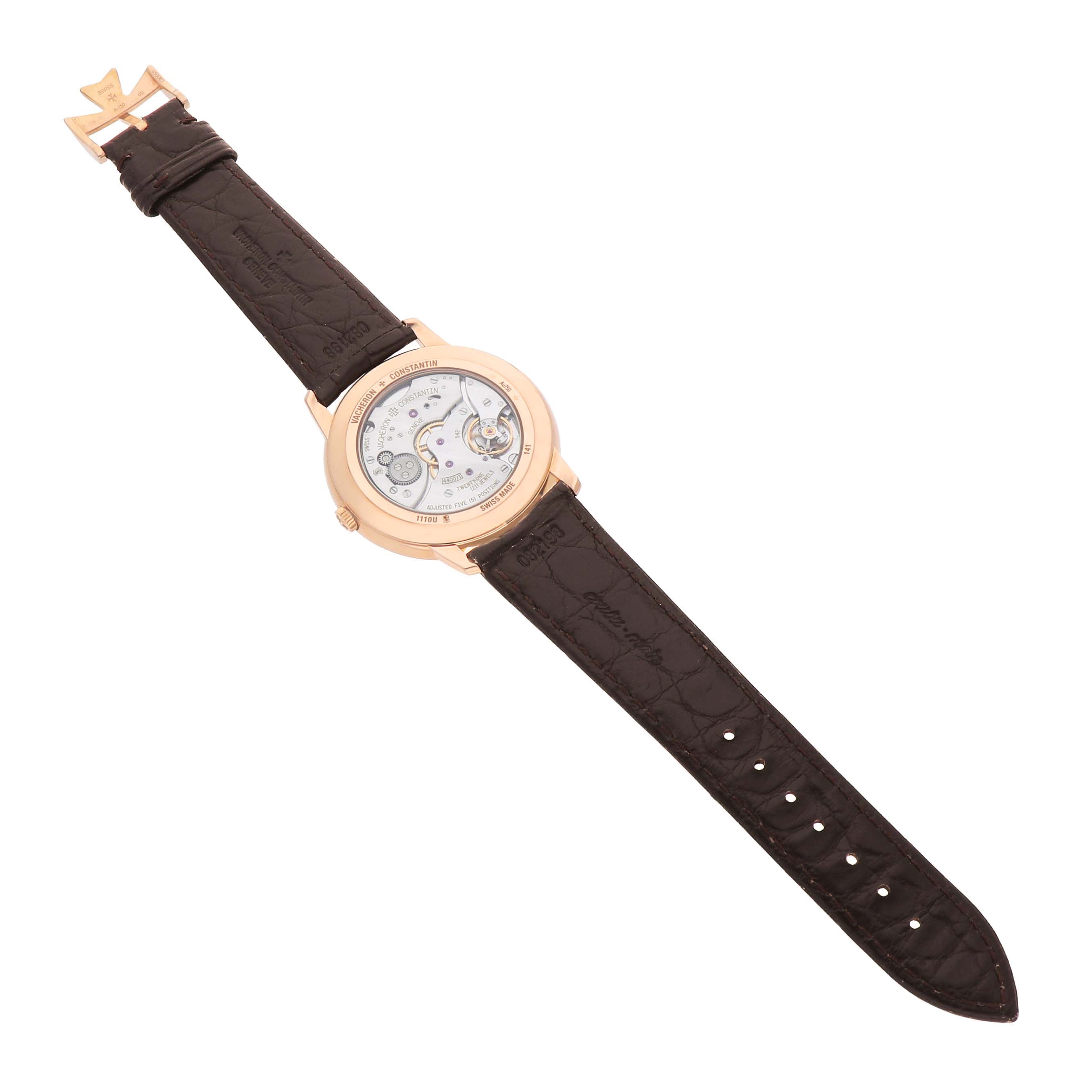 The Vacheron Constantin Patrimony 1110U/000R Men's Rose Gold Silver Dial watch is shown from the back, displaying its movement, case back, and leather strap.