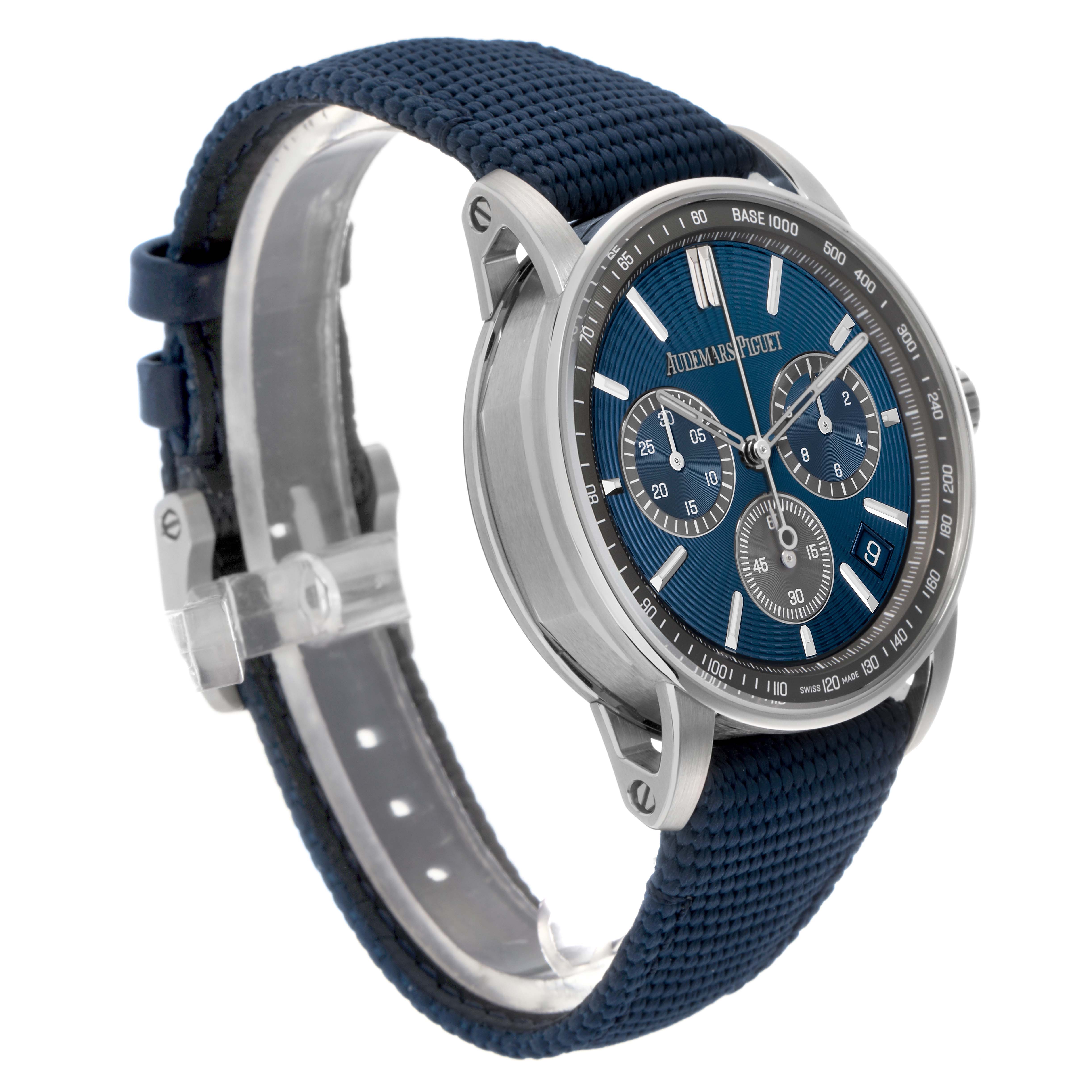 The Audemars Piguet Jules 26393ST.OO.A348KB.01 Men
s Stainless Steel Blue Dial 26393ST.OO.A348KB.01 Men
s Stainless Steel Blue Dial watch is shown at a three-quarter angle, displaying the dial, bezel, crown, and blue strap.