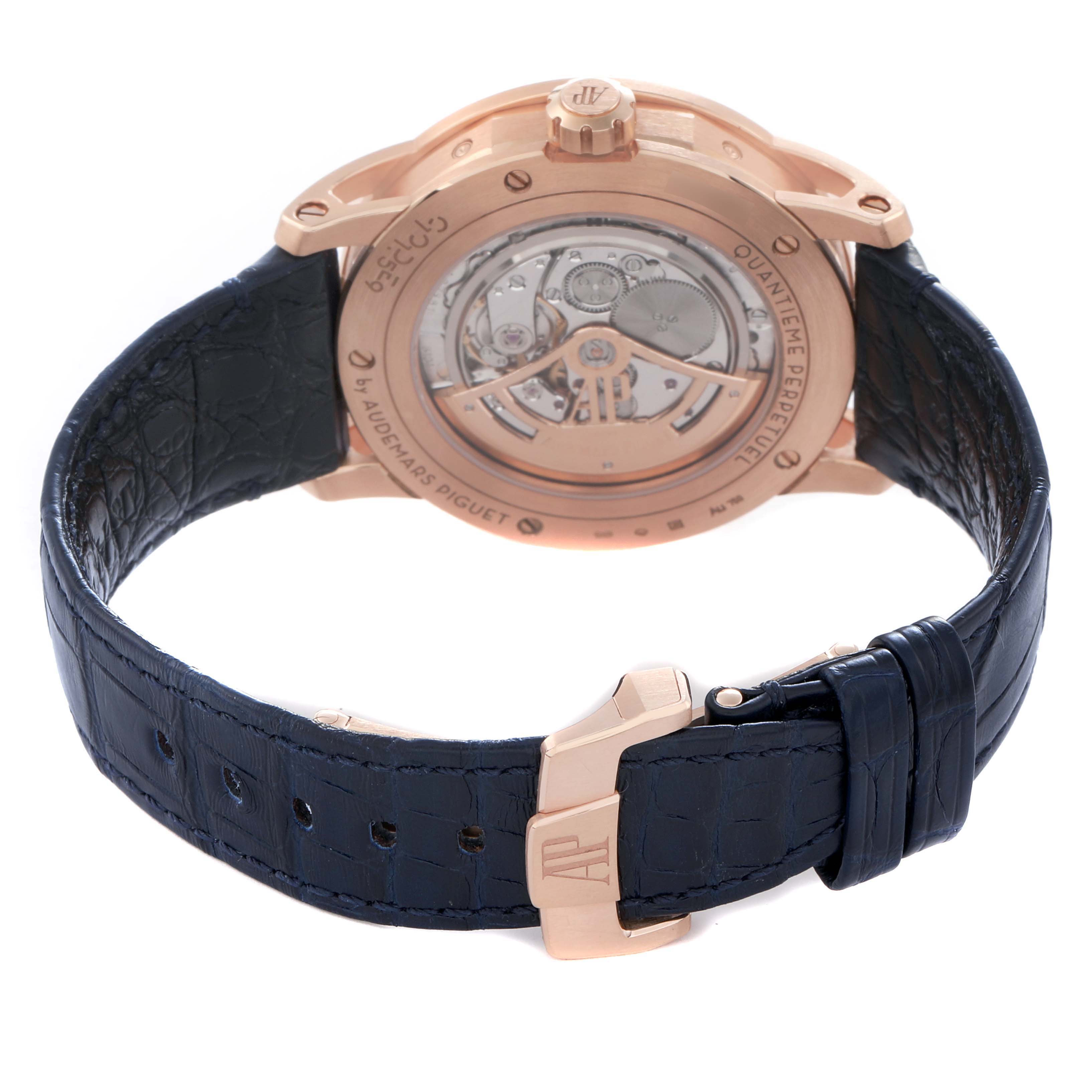 The Millenary by Audemars Piguet is shown from the back, highlighting the exposed movement and leather strap.