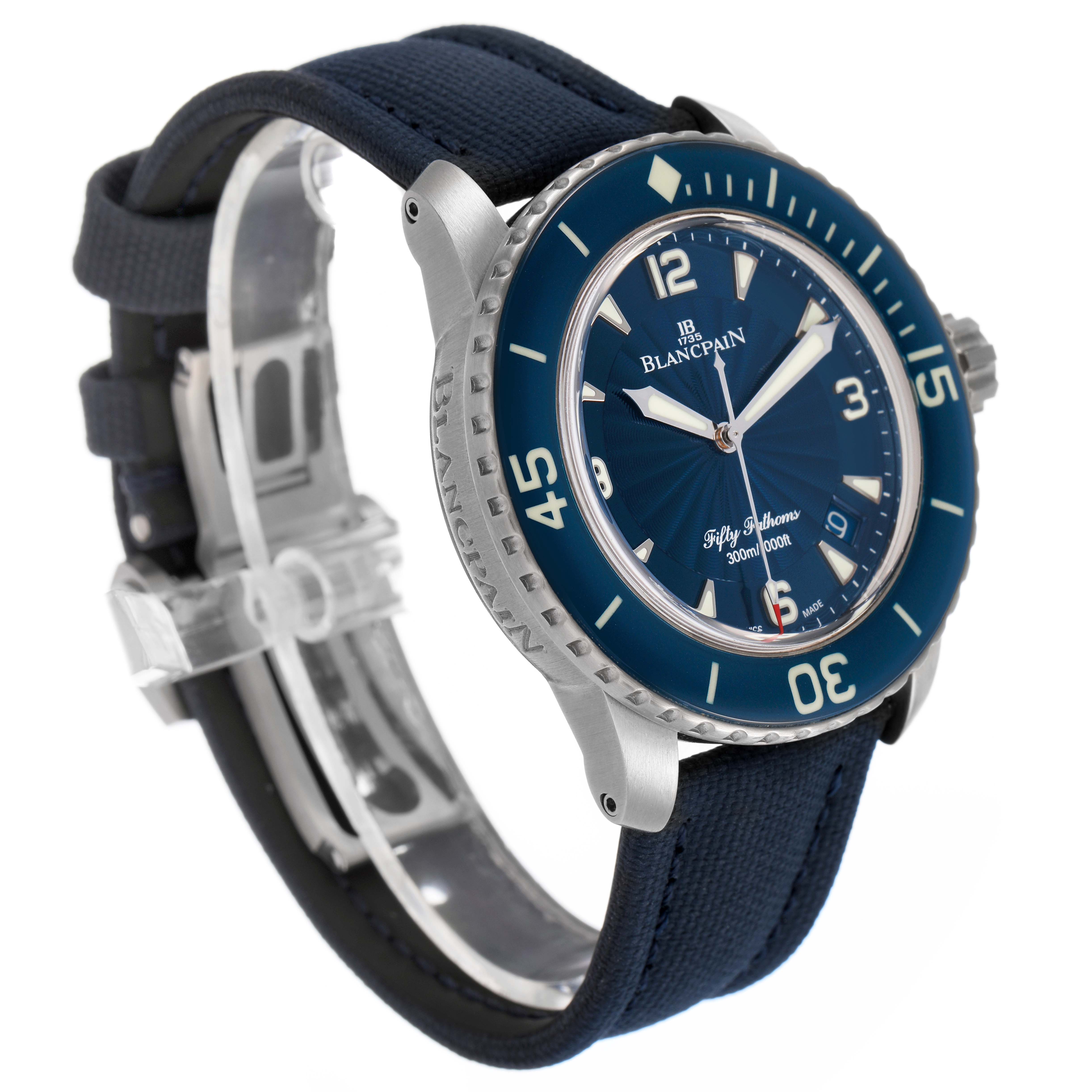 The Blancpain Fifty Fathoms 5015D-1140-52B Men's Stainless Steel Blue Dial watch is shown at a slight angle, highlighting the blue dial, bezel, and fabric strap.