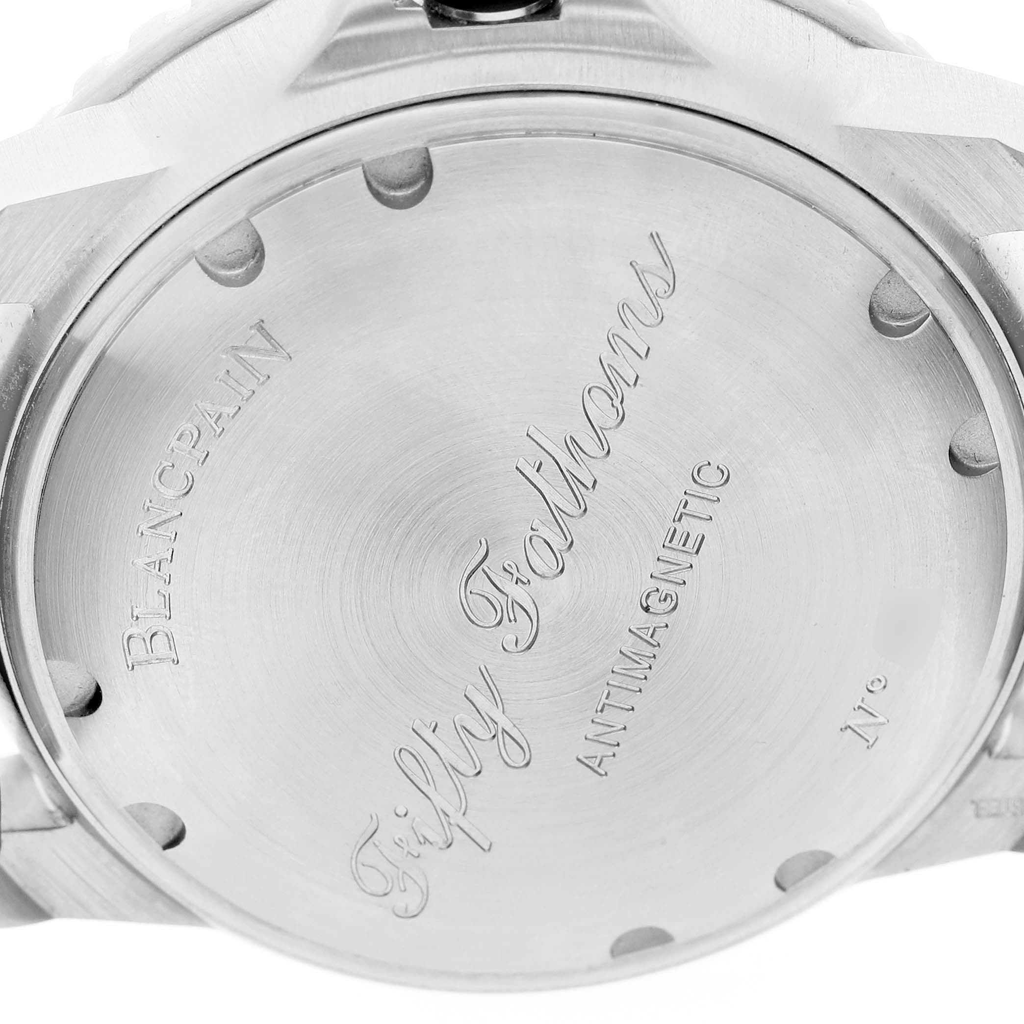 The image shows the back case of a Blancpain Fifty Fathoms 5015D-1140-52B Men's Stainless Steel Blue Dial watch, with engraved text and a brushed metal finish.