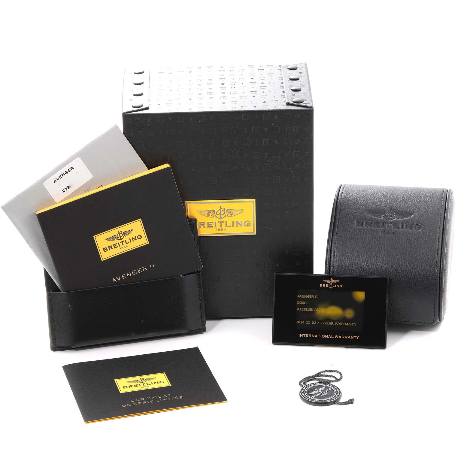 The image shows packaging materials, manuals, warranty card, and a carry case for a Breitling Avenger A13381 Men's Stainless Steel White Dial A13381 Men's Stainless Steel White Dial watch.