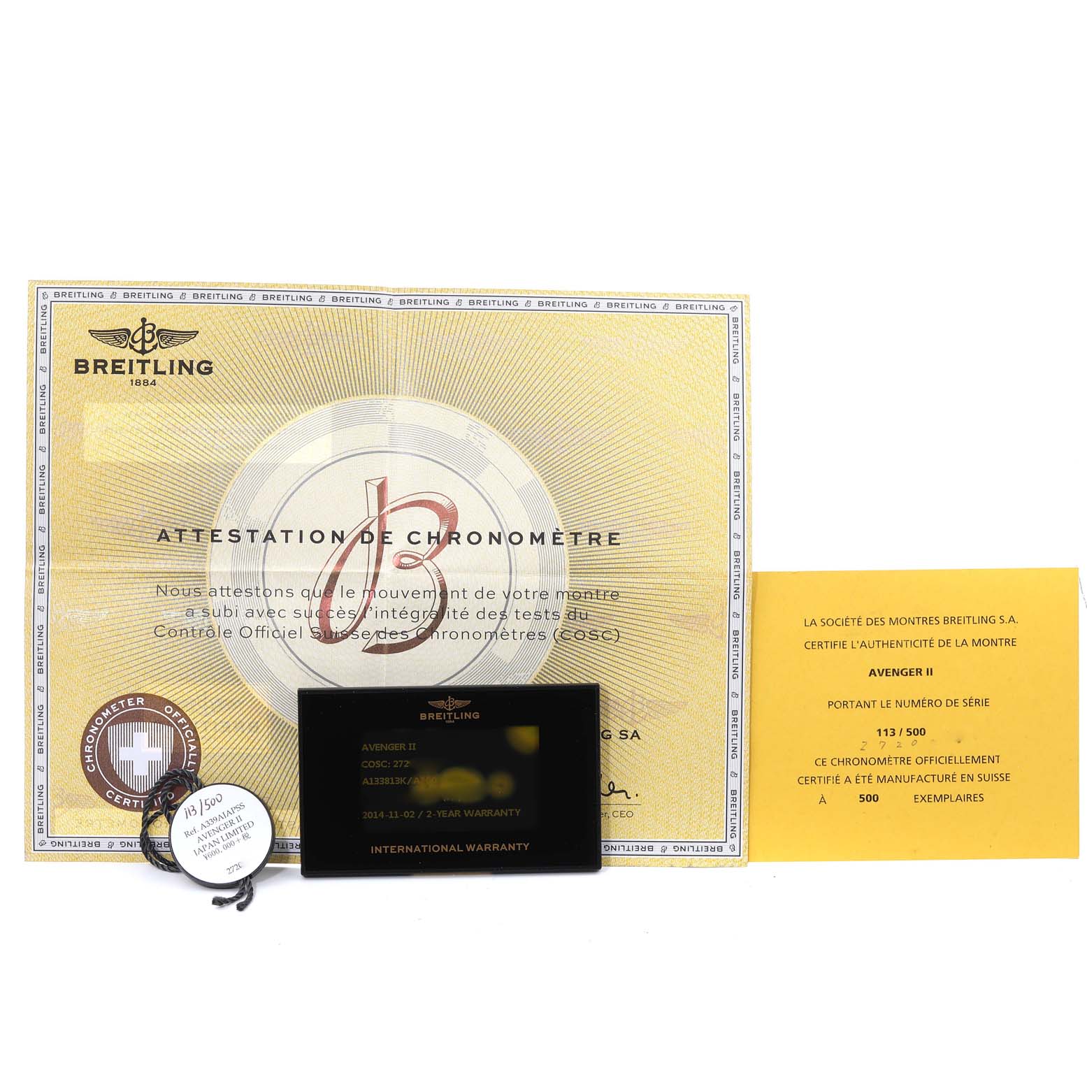 The image shows the warranty papers and chronometer certification for the Breitling Avenger A13381 Men's Stainless Steel White Dial A13381 Men's Stainless Steel White Dial II watch.