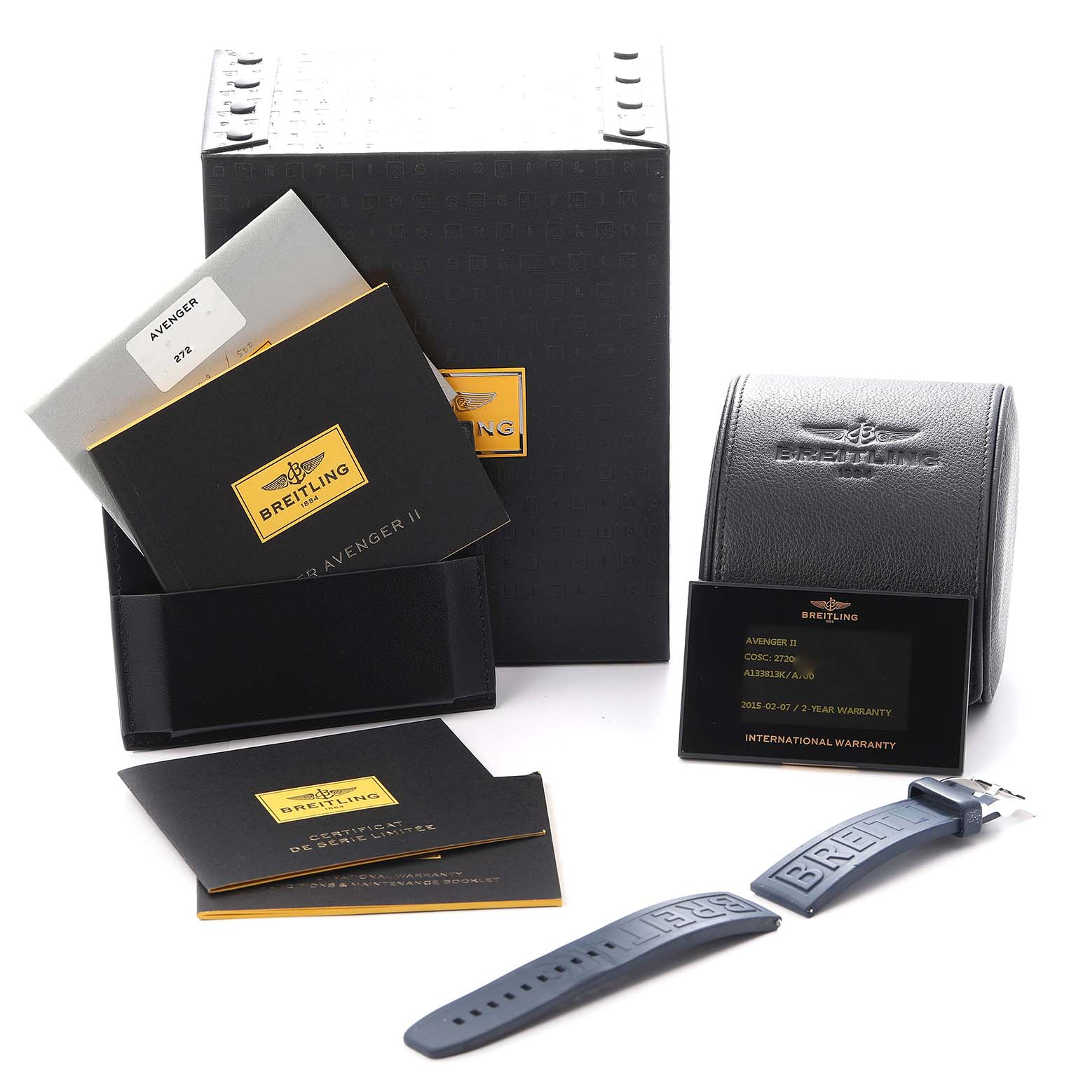 The image shows the Breitling Avenger A13381 Men
s Stainless Steel White Dial A13381 Men
s Stainless Steel White Dial model
s packaging, documentation, warranty card, and a spare strap from a frontal angle.