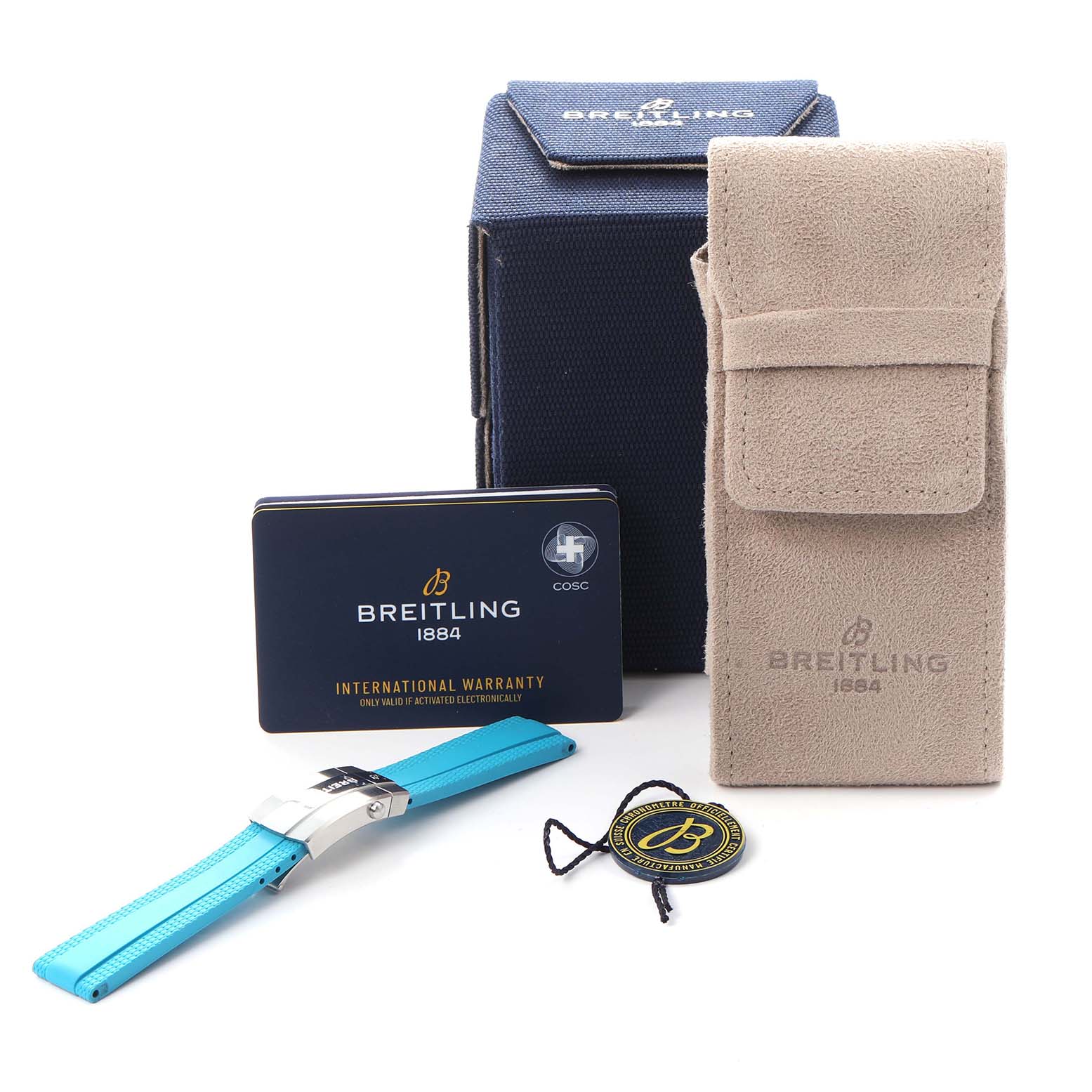 The image shows a Breitling A17377211C1A1 Women
s Stainless Steel Blue Dial A17377211C1A1 Women
s Stainless Steel Blue Dial Superocean 36 accessories set, including a blue strap, warranty card, box, beige pouch, and tag.