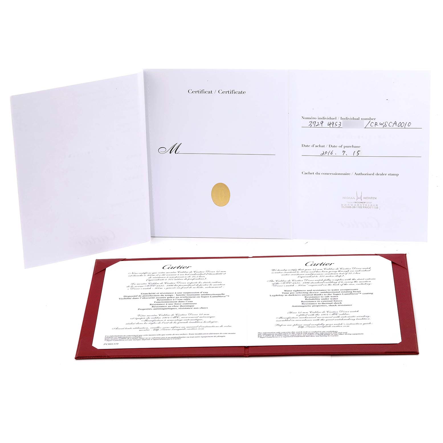 The image shows the warranty card and certificate papers for a Calibre de Cartier watch by Cartier.
