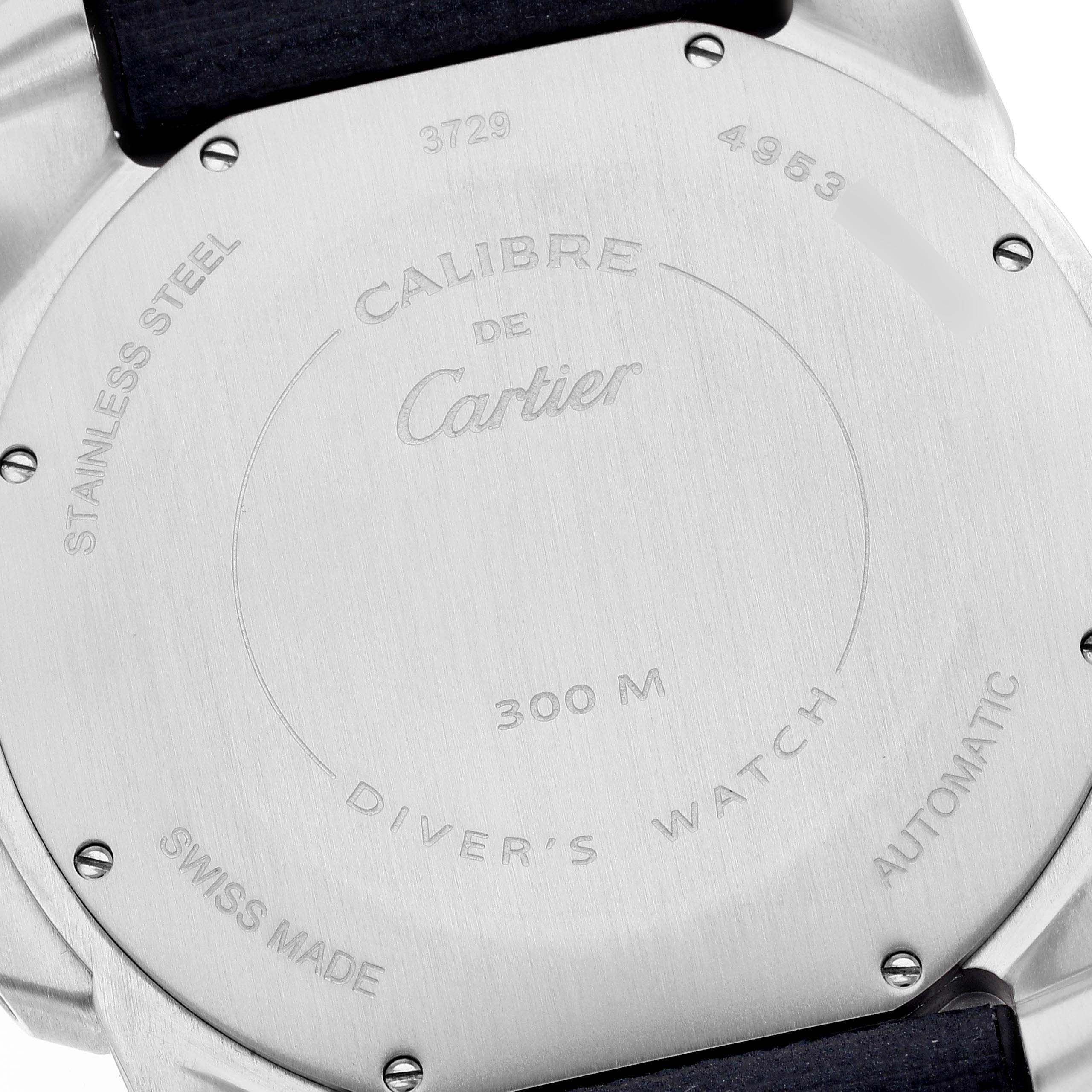 The image shows the back case of a Calibre de Cartier watch by Cartier, including details such as water resistance, material, and manufacturing information.