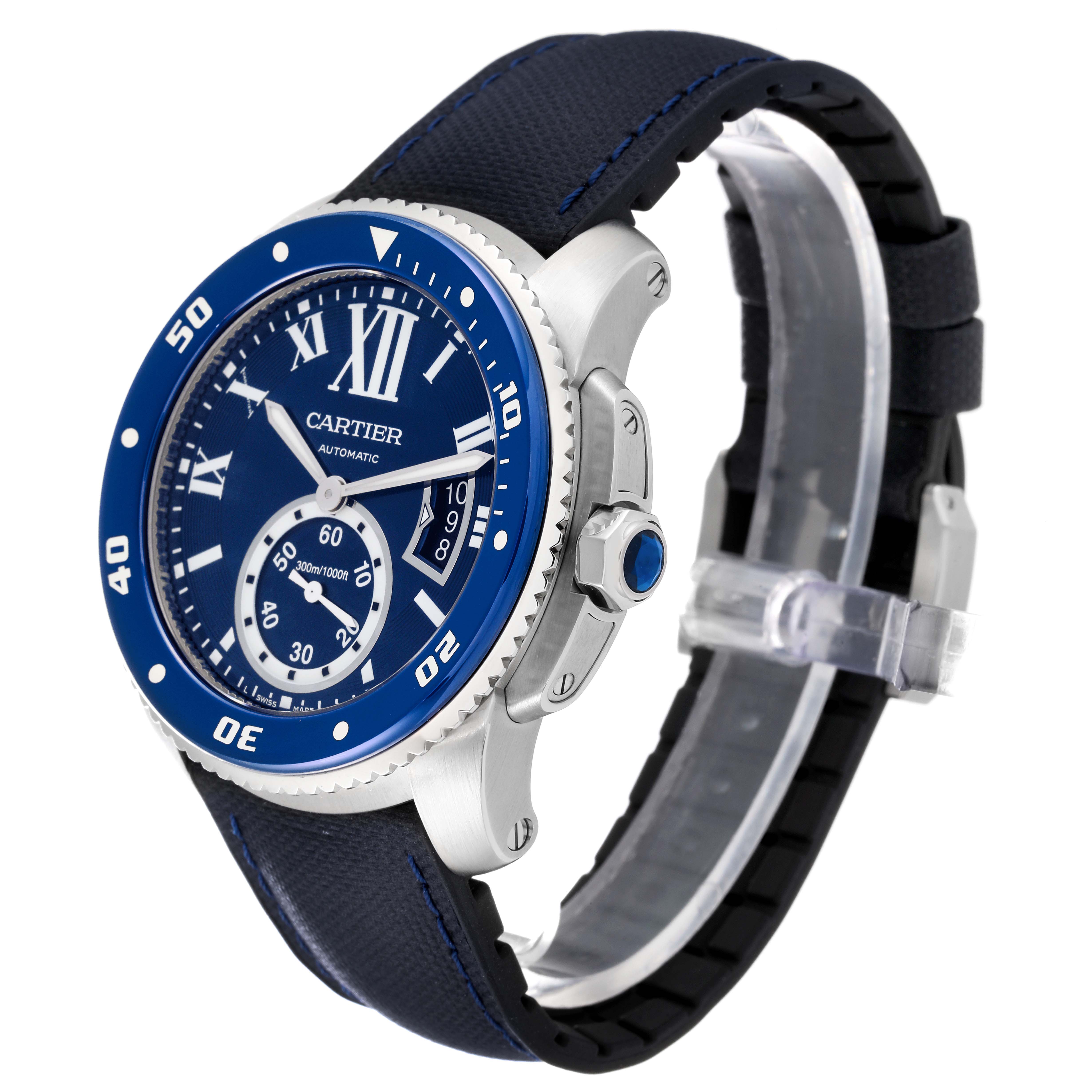 The Calibre de Cartier watch is shown from a three-quarter angle highlighting the bezel, dial, and strap.