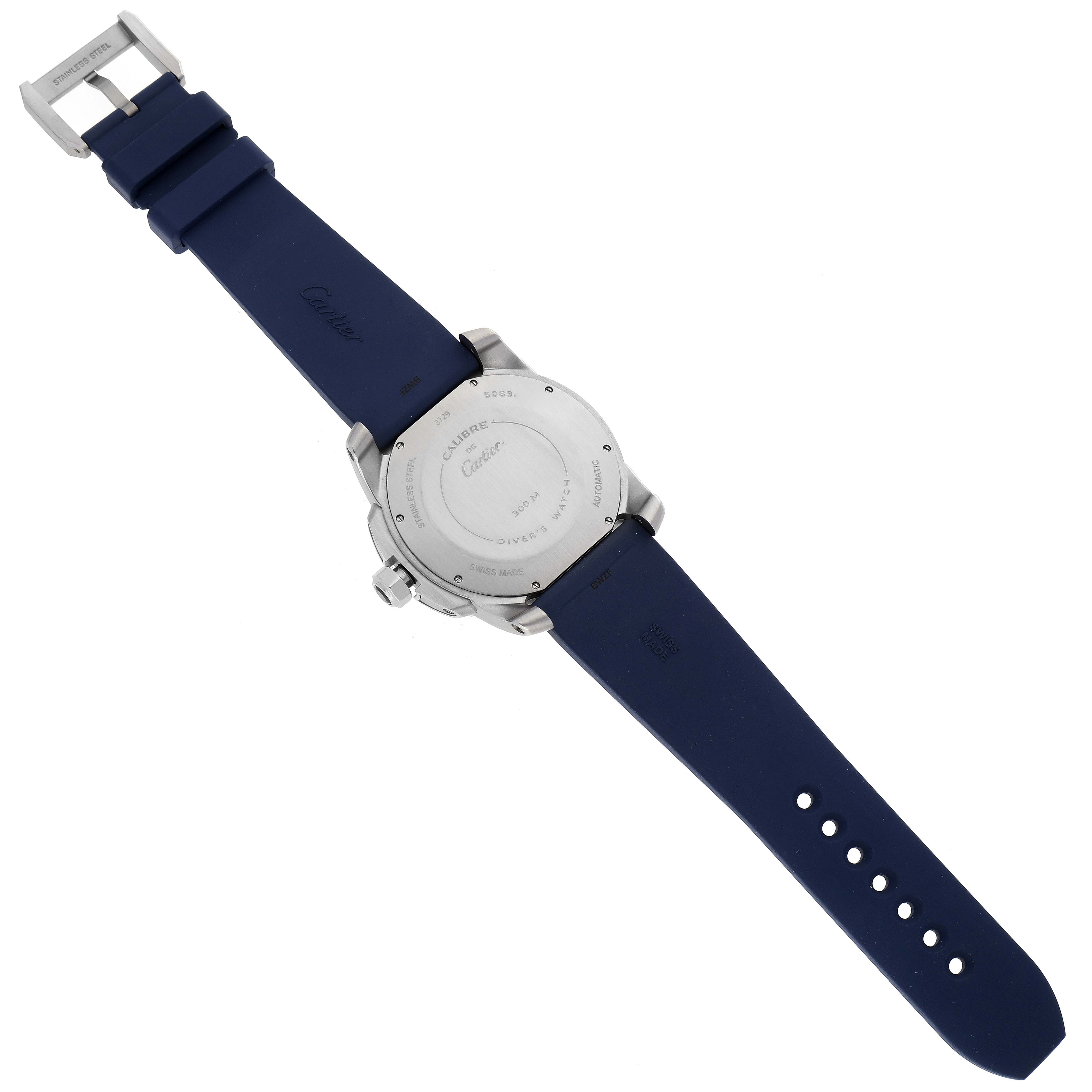 The image shows the back case and strap of a Calibre de Cartier watch by Cartier, displayed flat.