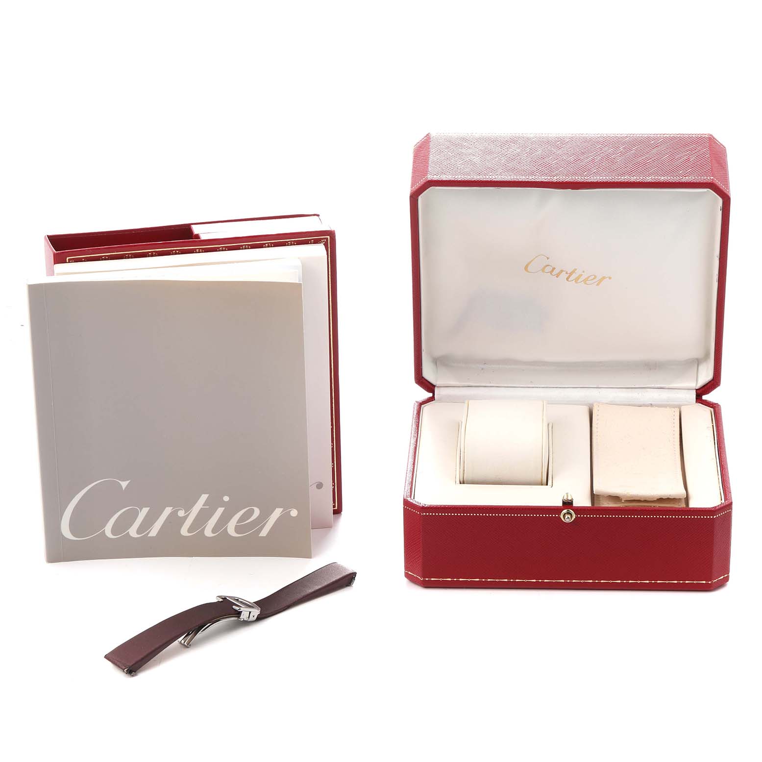 The image shows a Cartier Roadster W62017V3 Women
s Stainless Steel Pink Dial W62017V3 Women
s Stainless Steel Pink Dial watch box, an extra strap, and paperwork from a front angle.