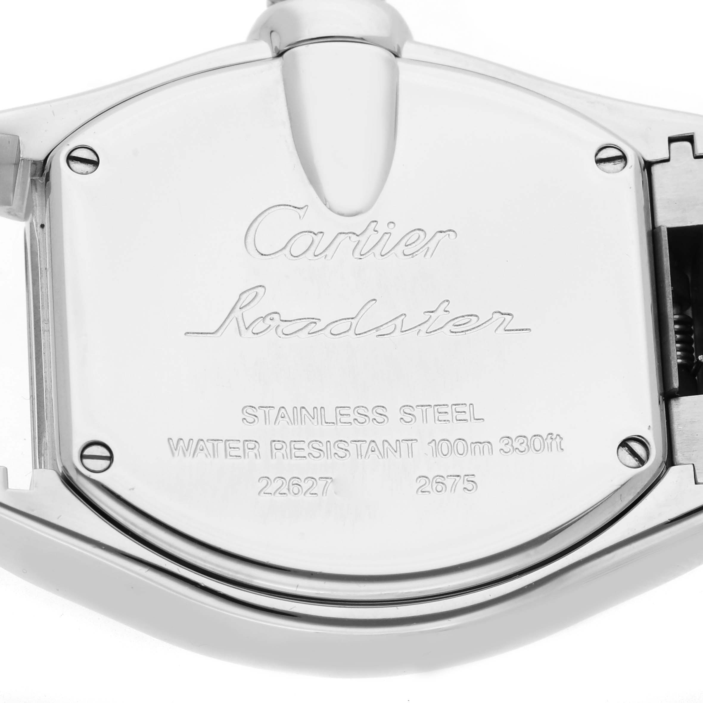 The image shows the back case of a Cartier Roadster W62016V3 Women
s Stainless Steel Silver Dial W62016V3 Women
s Stainless Steel Silver Dial watch, highlighting its stainless steel and water resistance details.