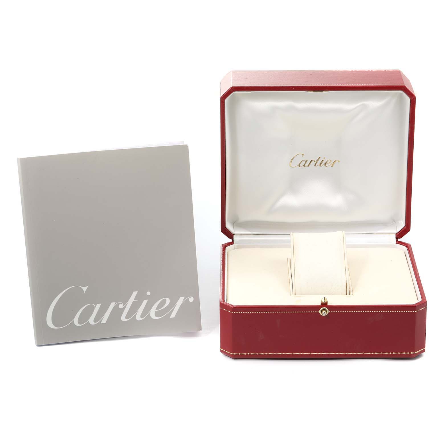 The image shows an open Cartier watch box and a booklet, displaying the Roadster model
s accessory packaging.