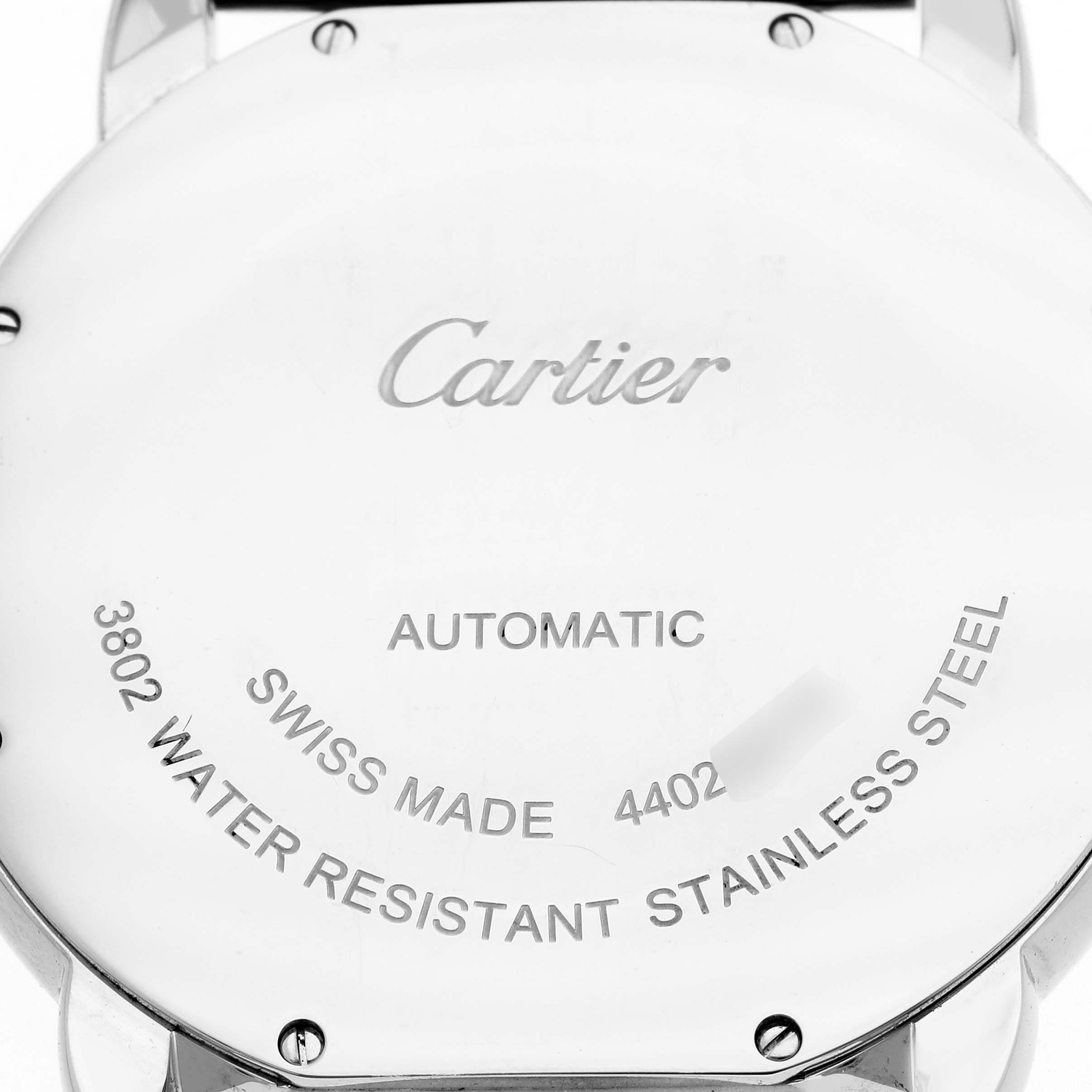 The image shows the case back of the Cartier Ronde WSRN0023 Men's Stainless Steel Blue Dial WSRN0023 Men's Stainless Steel Blue Dial model, highlighting the inscriptions and screws.