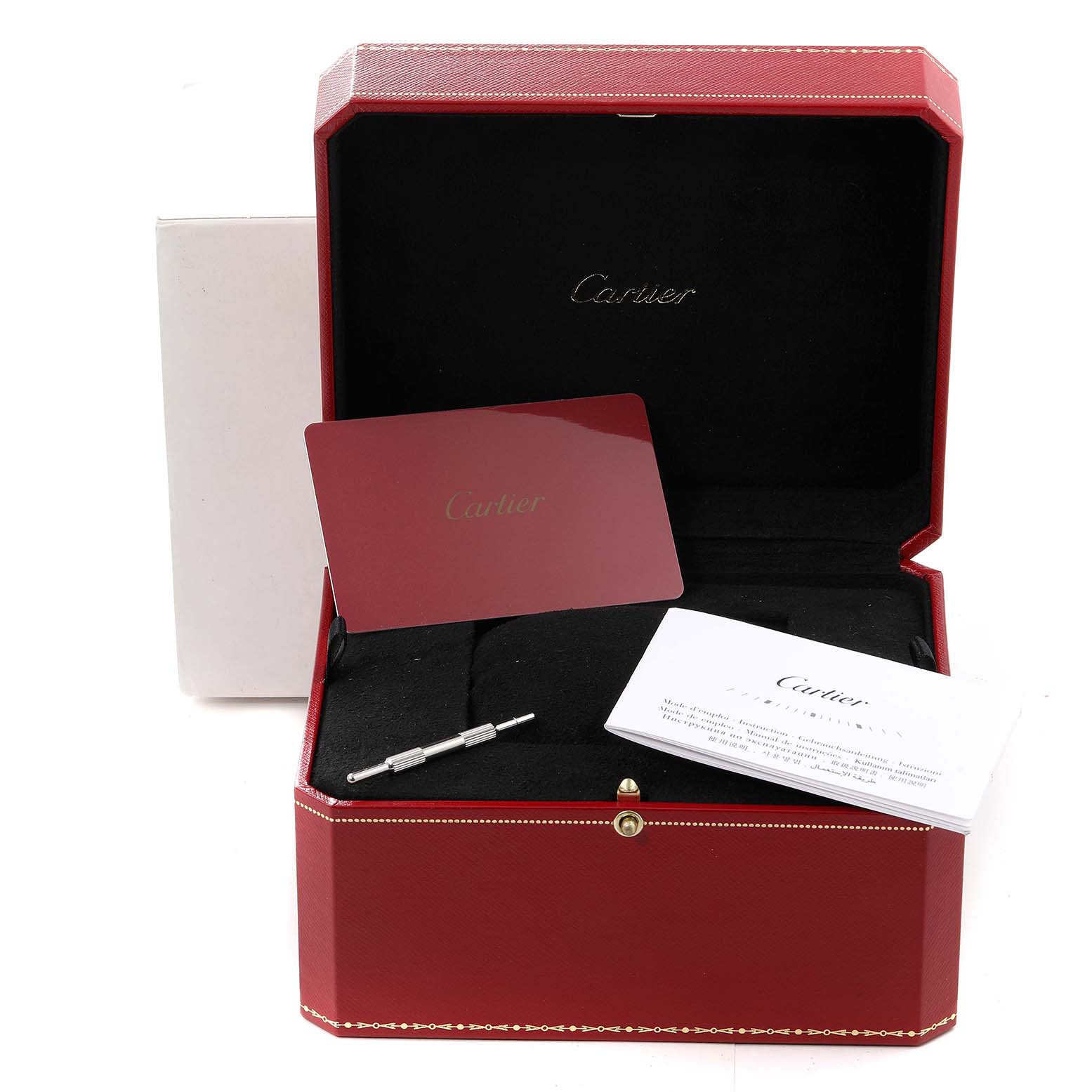 This image shows a Cartier Santos WSSA0013 Men's Stainless Steel Blue Dial WSSA0013 Men's Stainless Steel Blue Dial watch box, including a tool, booklet, and authentication card.