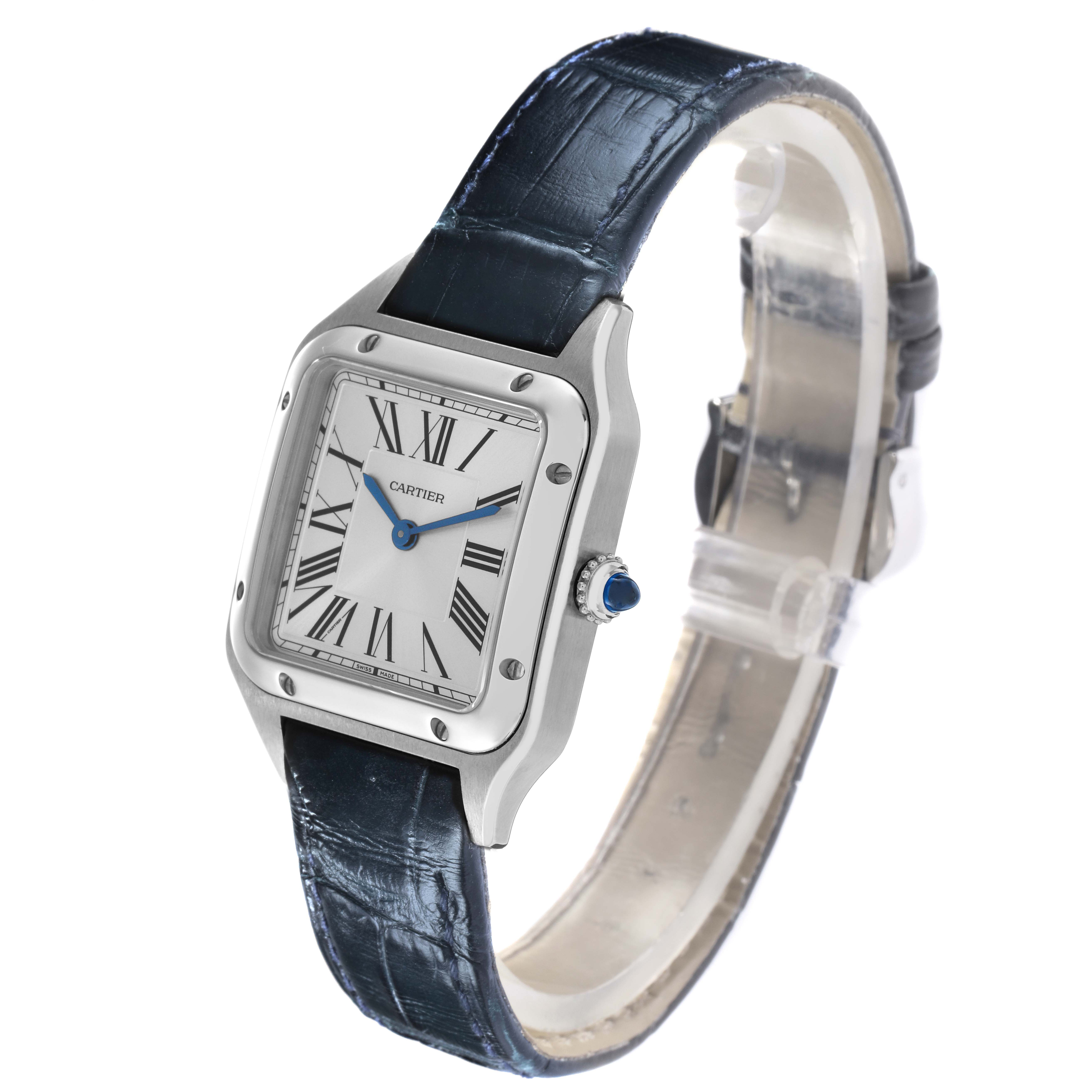 The Cartier Santos WSSA0023 Women
s Stainless Steel Silver Dial WSSA0023 Women
s Stainless Steel Silver Dial watch is shown at an angled view, displaying the dial, crown, bezel, and leather strap.