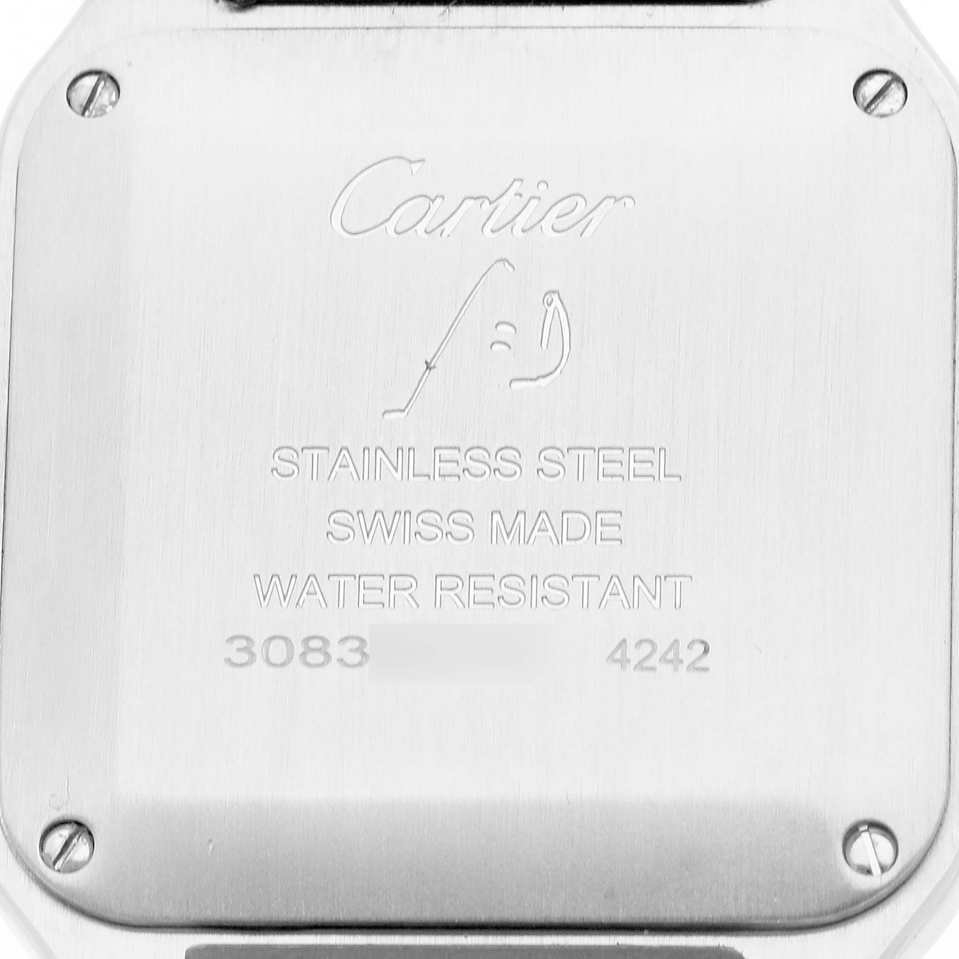 The image shows the back case of a Cartier Santos WSSA0023 Women
s Stainless Steel Silver Dial WSSA0023 Women
s Stainless Steel Silver Dial watch featuring engraving details and screws.