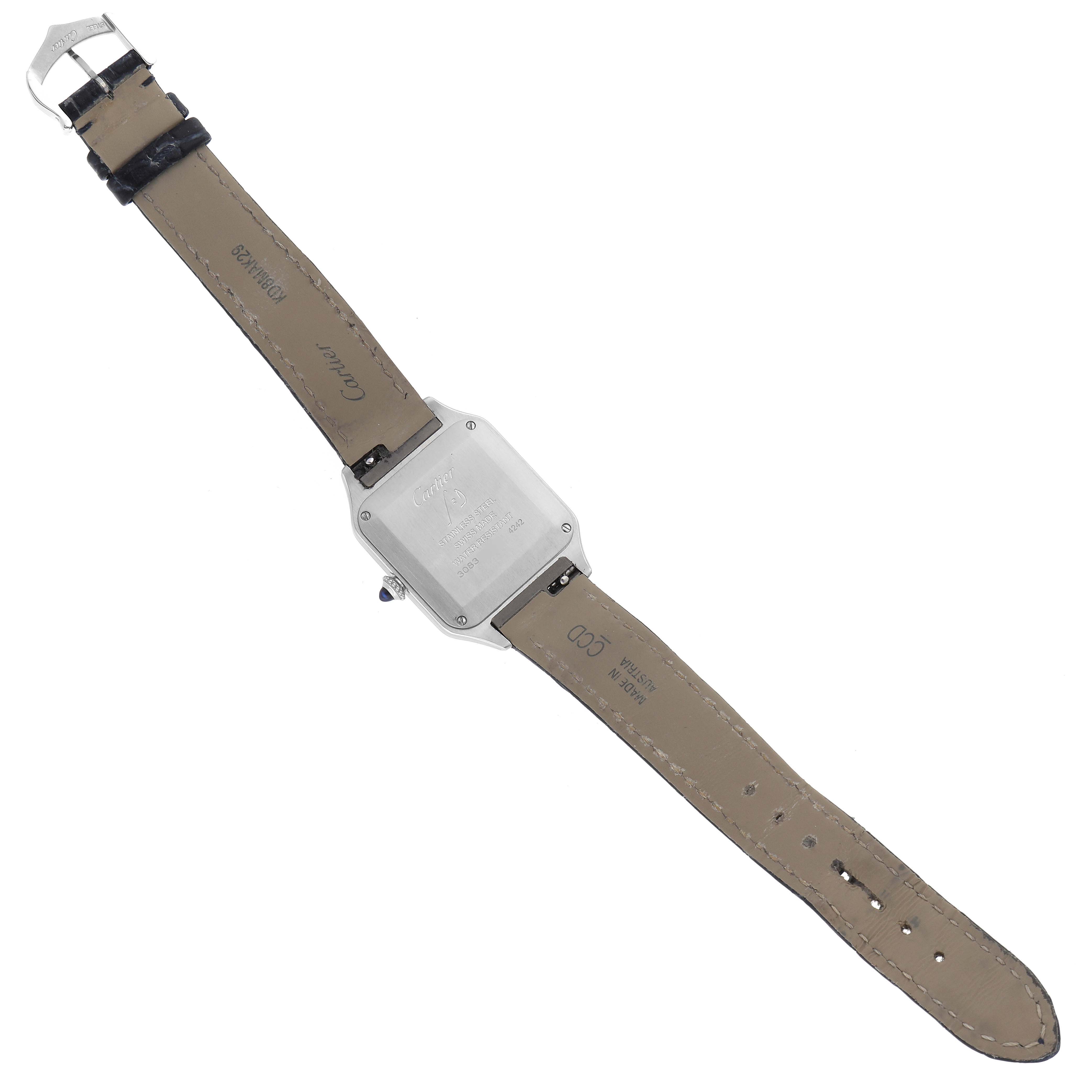 The Cartier Santos WSSA0023 Women
s Stainless Steel Silver Dial WSSA0023 Women
s Stainless Steel Silver Dial watch is shown from the back, displaying the case back and leather strap.