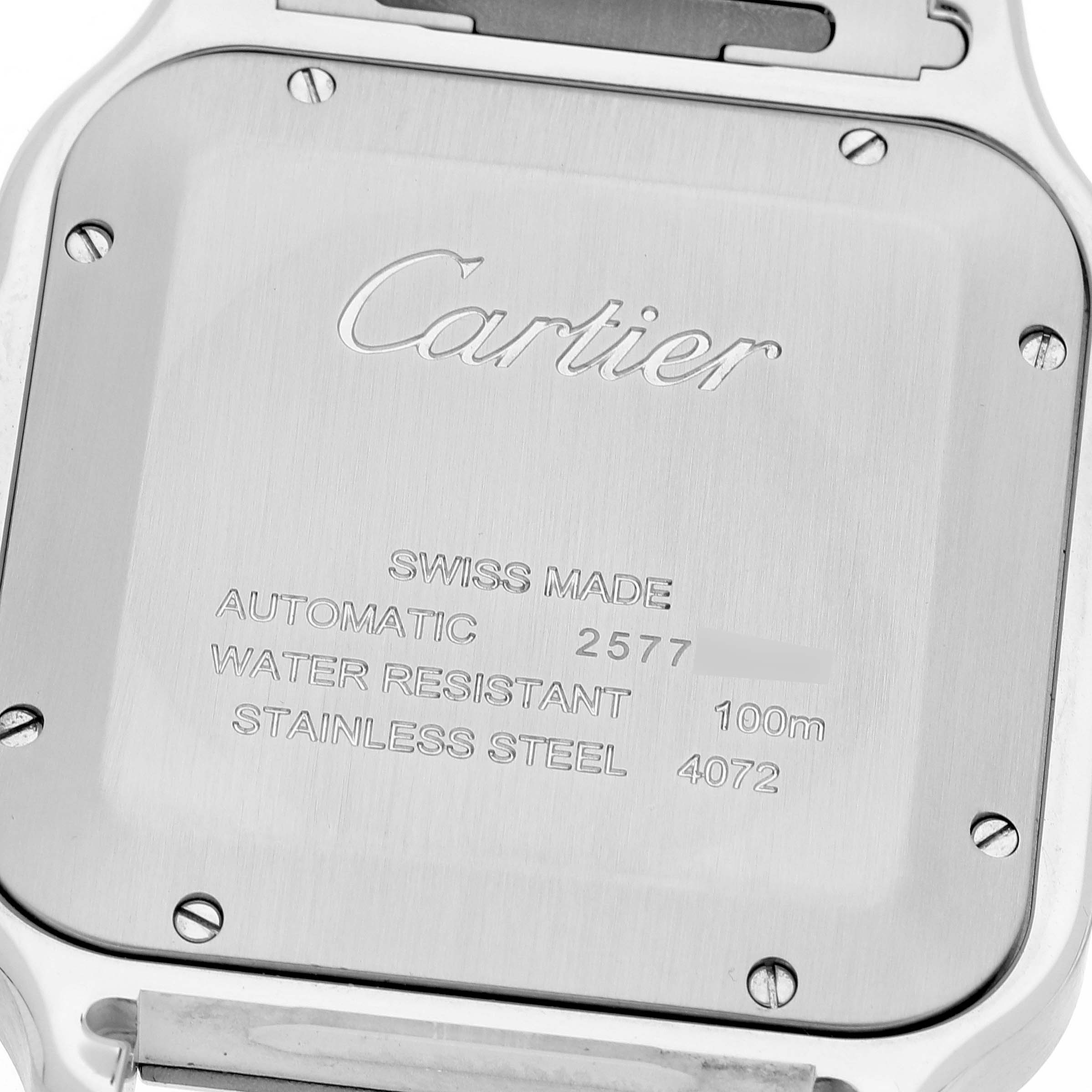 This image shows the back case of a Santos model by Cartier, highlighting its features and engravings.