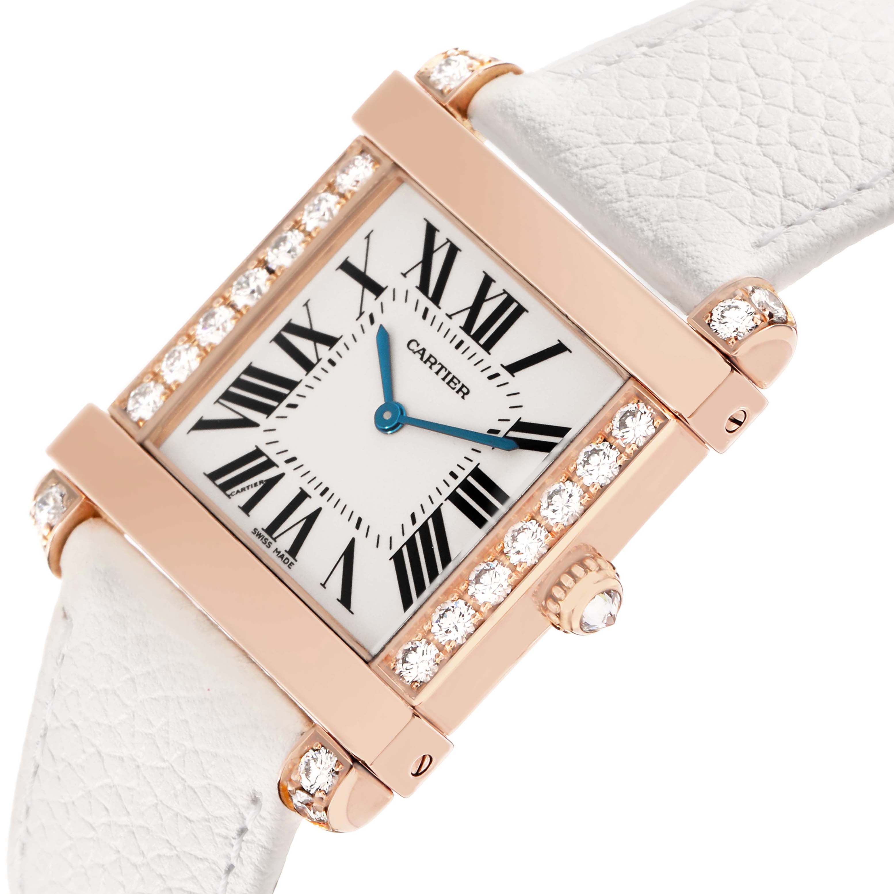 The Cartier Tank Louis WE300351 Women's Rose Gold Silver Dial watch is shown at an angled top view, displaying the face, diamond-encrusted bezel, and crown.
